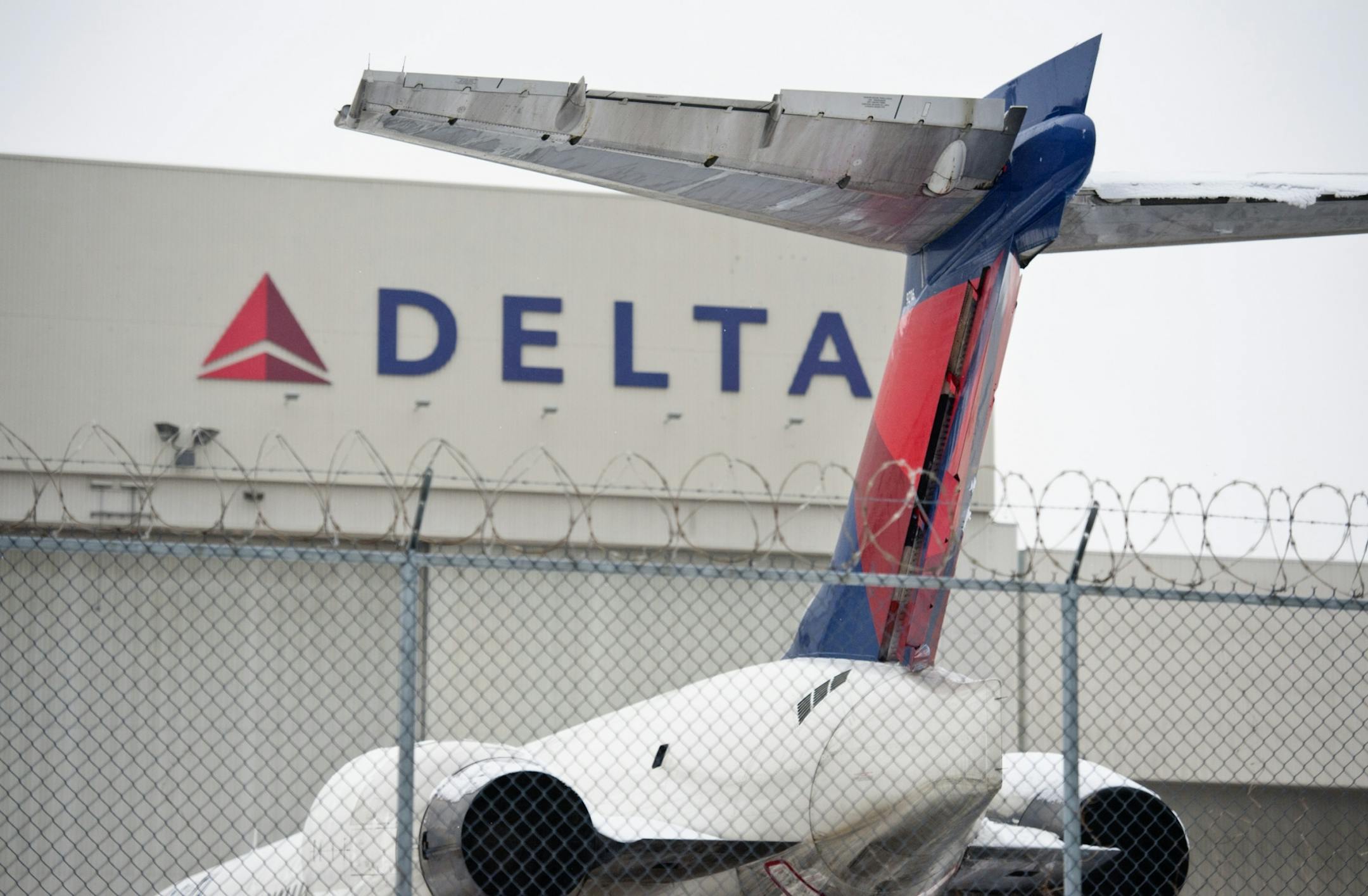 Delta Airlinessit outside in front of Building C Wednesday, February 29, 2012, where some of the warehouse operations are located. Delta Airlines announced it was moving its warehouse operations to Atlanta taking as many as 150 jobs there.