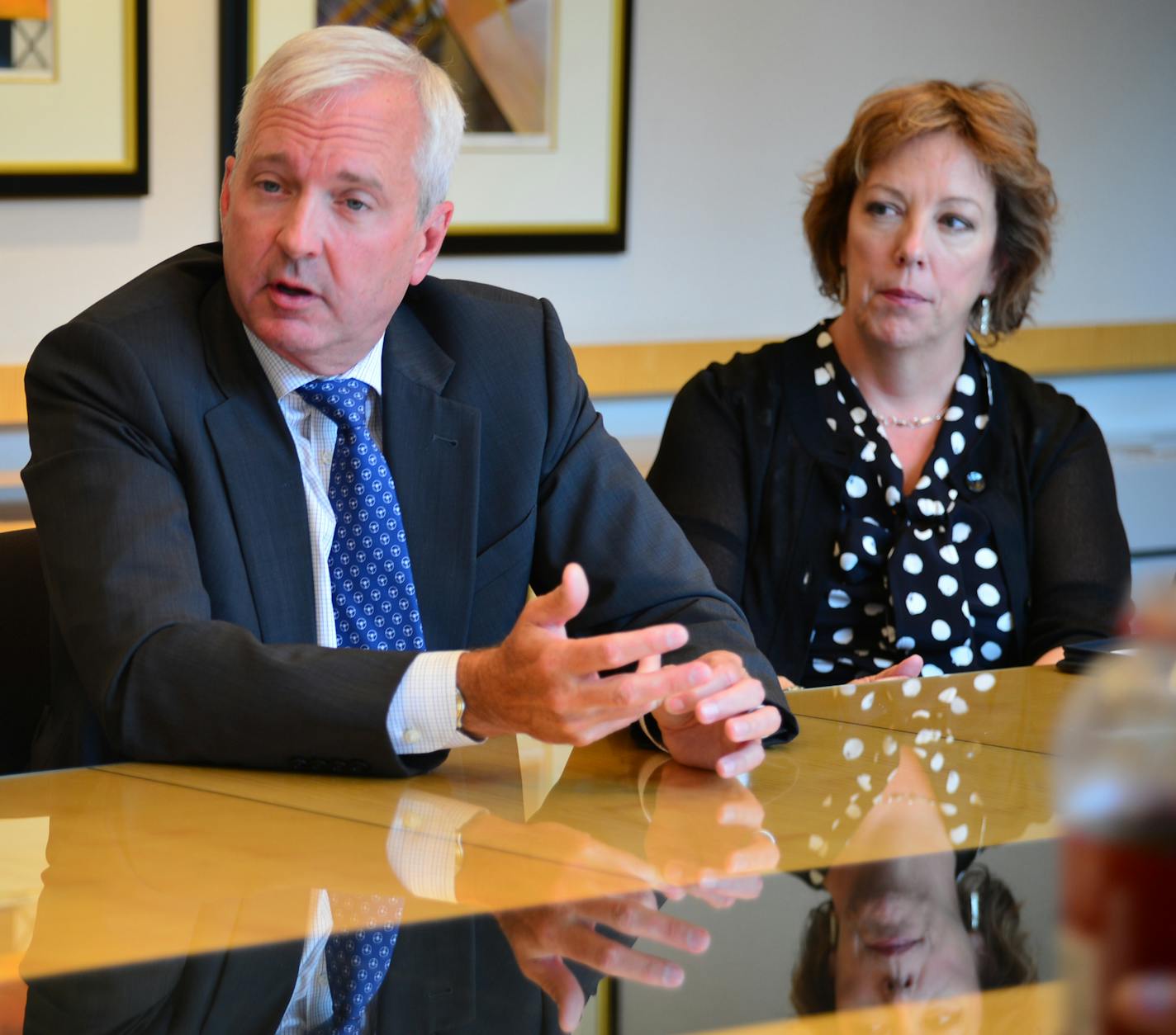 Xcel Energy's Ben Fowke, shown here with regional vice president Laura McCarten, is the third-highest paid CEO in Minnesota in this year's Star Tribune ranking.