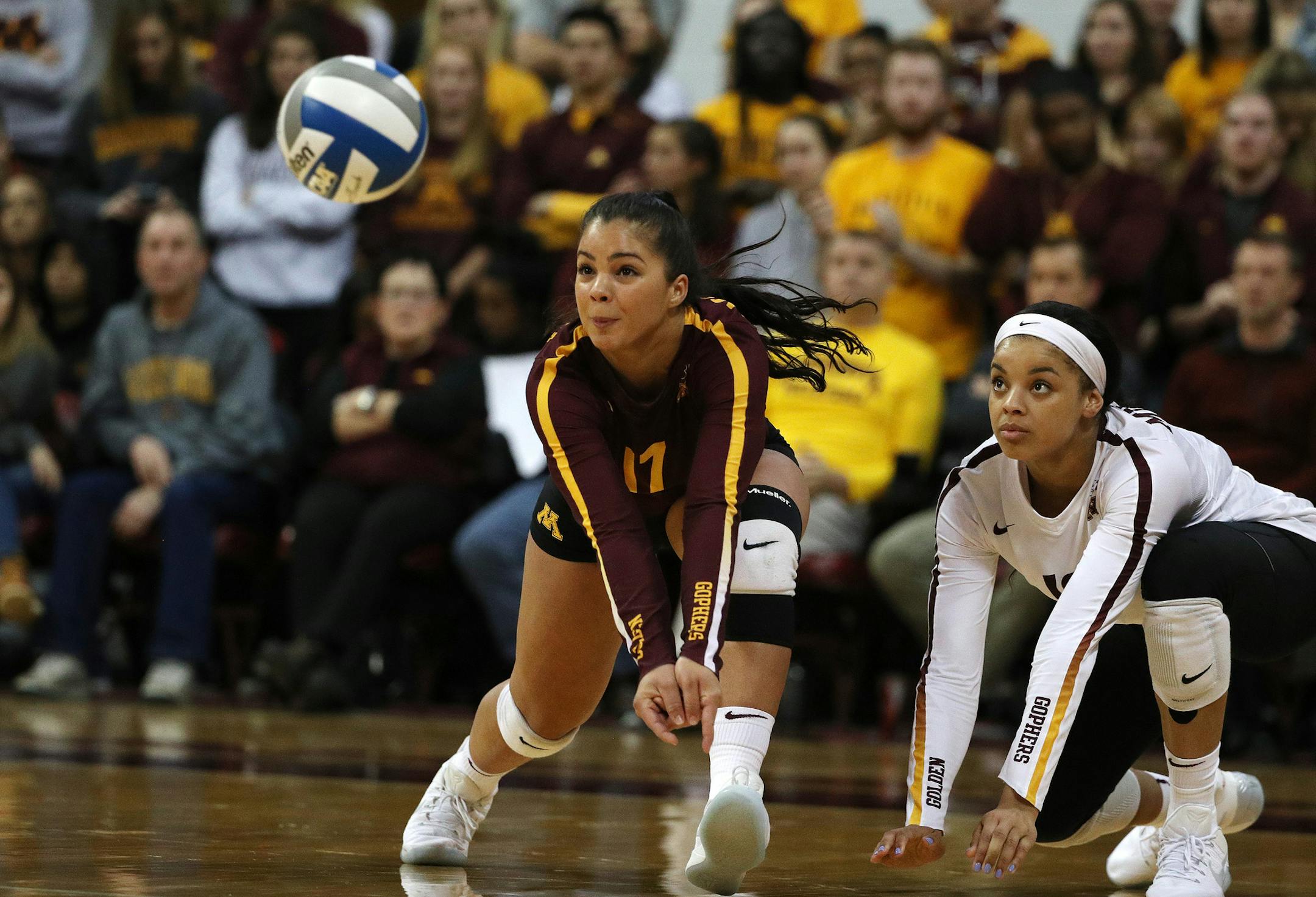 Minnesota libero/defensive specialist Dalianliz Rosado (17) and Minnesota outside hitter Alexis Hart (19) both looked to return a serve in the second set. ] ANTHONY SOUFFLE ï anthony.souffle@startribune.com Minnesota and North Dakota played a volleyball match in the NCAA tournament Friday, Dec. 1, 2017 at the Maturi Sports Pavilion on the campus of the University of Minnesota in Minneapolis.