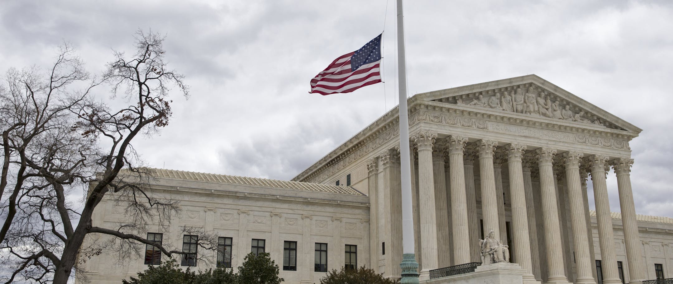 In honor of Justice Antonin Scalia who died on Feb. 13, 2016, the flags in the Supreme Court building's front plaza will continue to fly at half-staff for a month, in Washington, Thursday, Feb. 25, 2016. Scaliaís unexpected death triggered an election-year political standoff on Capitol Hill as leaders in the GOP-controlled Congress insist President Obama should not nominate a replacement for Scalia and should leave that for the next president who is elected in November. (AP Photo/J. Scott A