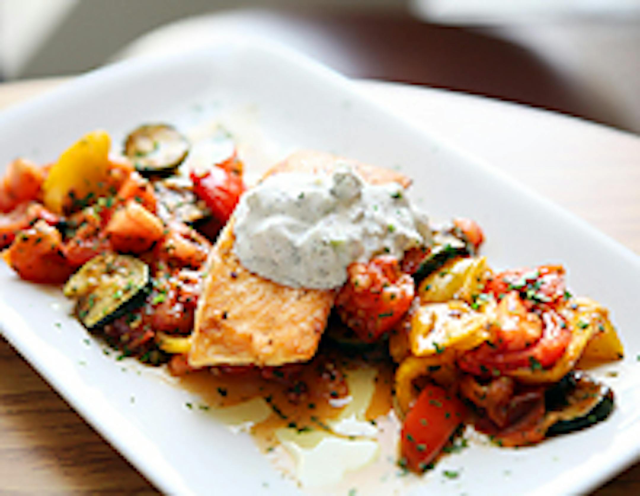 Pan-roasted salmon with cucumber yogurt sauce and roasted vegetables