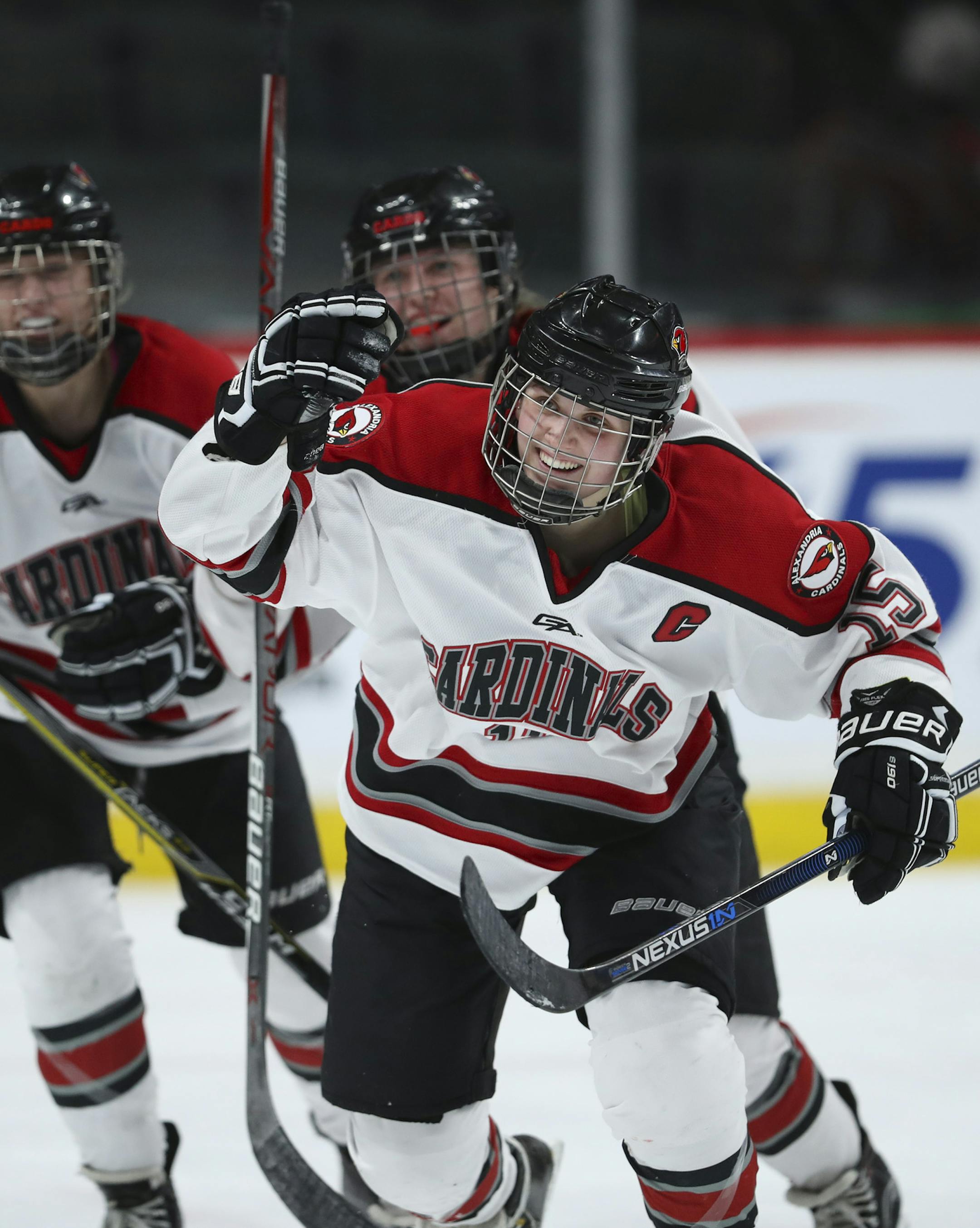 Alexandria's Kristin Trosvig (15) skated back to the bench to celebrate her second period goal, that gave the Cardinals a 2-1 lead over St. Paul United. ] JEFF WHEELER ï jeff.wheeler@startribune.com Alexandria and St. Paul United battled in a Class 1A quarterfinal game in the Girls' Hockey Tournament Wednesday night, February 21, 2018 at Xcel Energy Center in St. Paul.