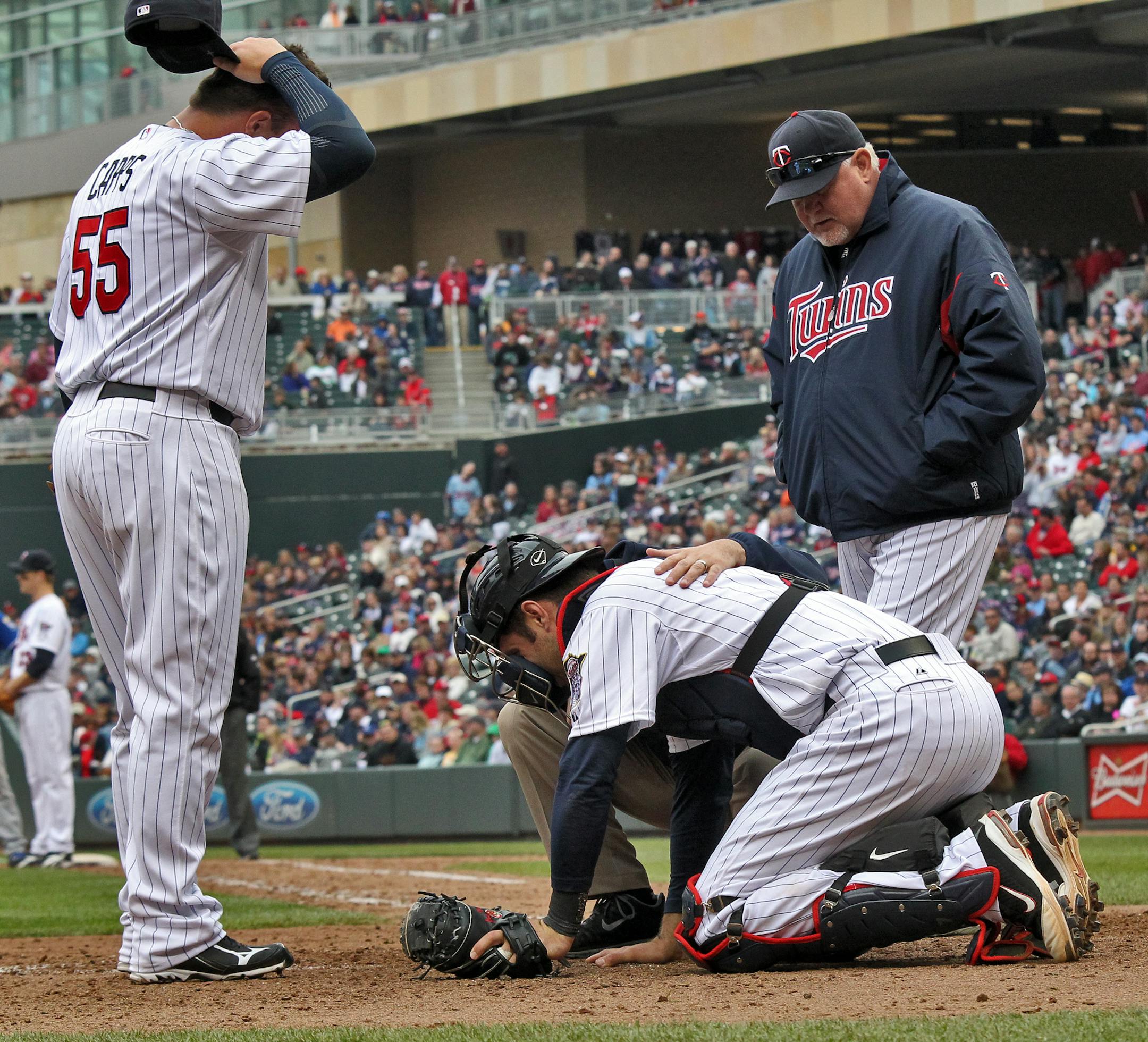 With Joe Mauer's move to first base, Twins manager Ron Gardenhire won't have to worry about Mauer taking punishment behind the plate.