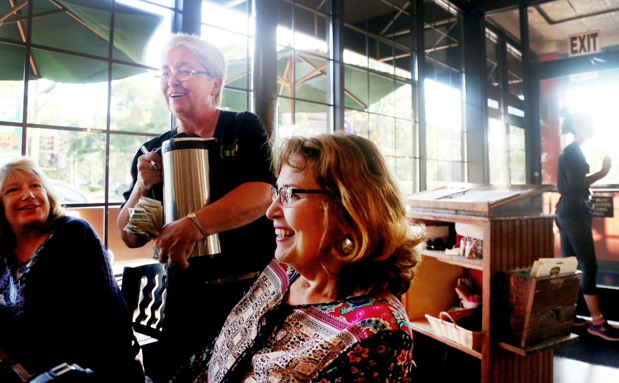 Colossal Cafe server Renee Carlson, holds a coffee pot while talking to customers at a table at the restaurant Thursday, Sept. 1, 2016, in St. Paul, MN. Colossal got STAR money for a new awning and other improvements at their Grand Ave location. ](DAVID JOLES/STARTRIBUNE)djoles@startribune Creating jobs and keeping businesses in St. Paul has increasingly become a top priority for city leaders but they have different visions for how to fund that goal in 2017. One of the biggest new spending propo