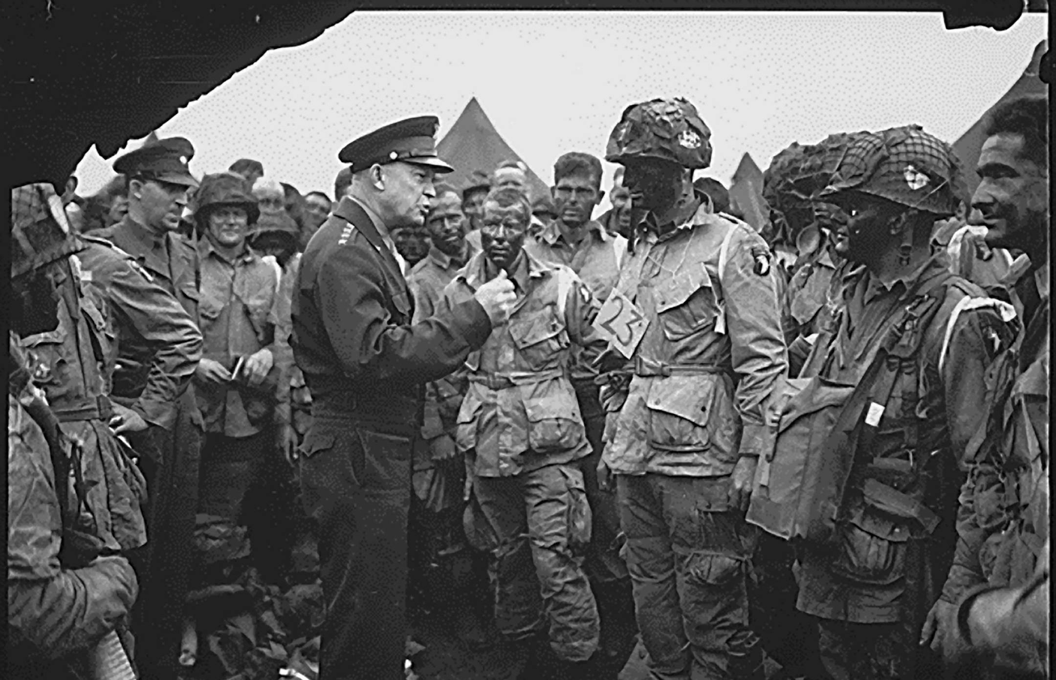 Gen. Dwight D. Eisenhower meets with U.S. Army paratroopers from the 101st Division in England, prior to the Normandy Invasion, June 5, 1944. (Department of the Army/National Achives/TNS)