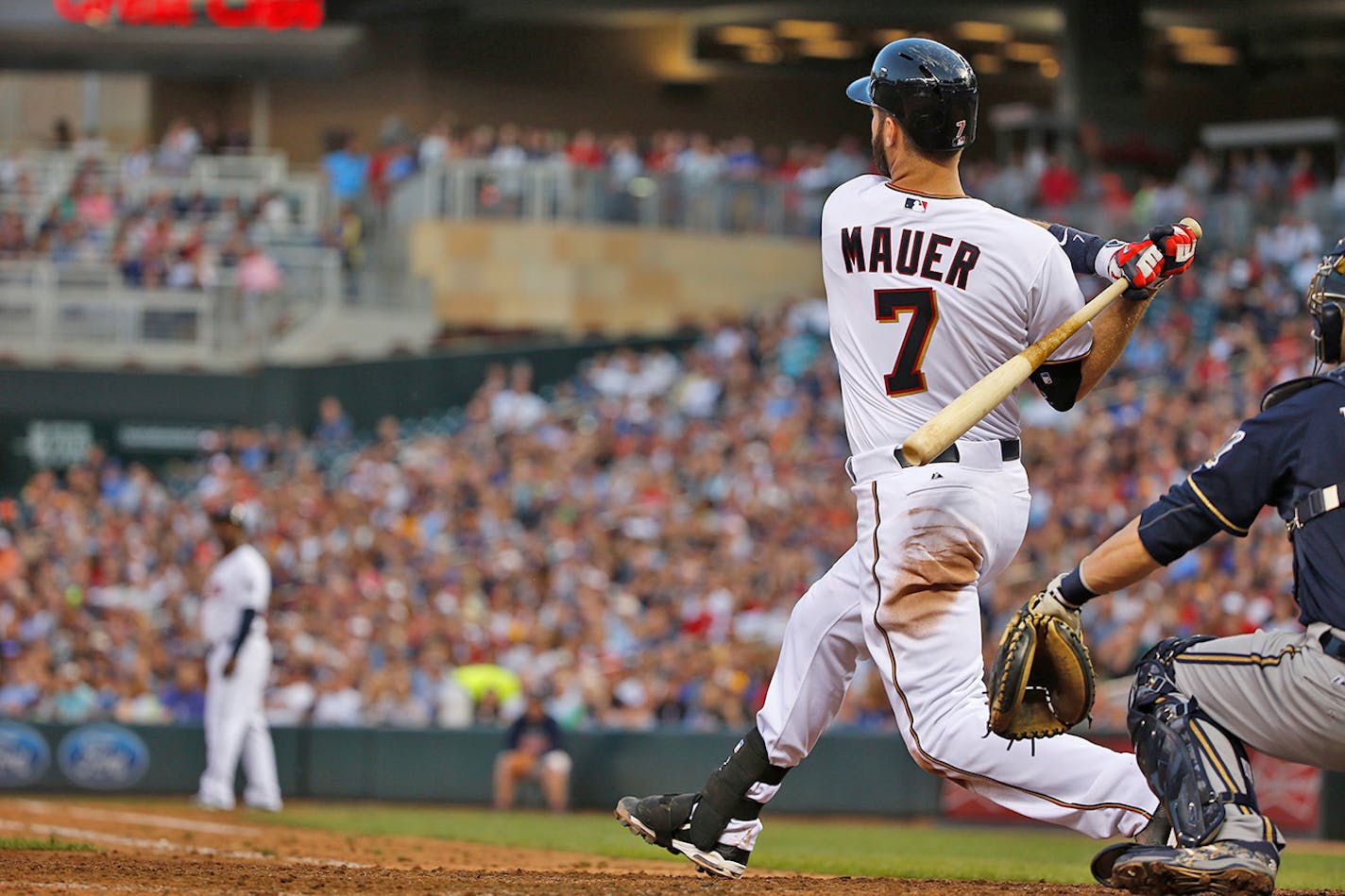 Joe Mauer of the Twins hit a three run home run against the Brewers on June 5.