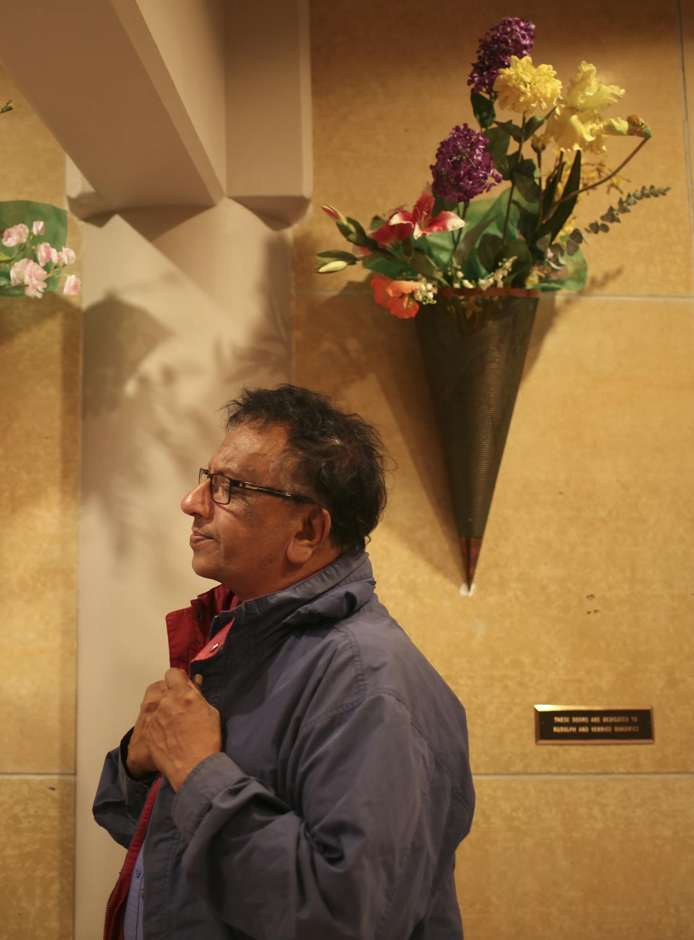 Ash Dias commented on the archbishop's deposition as he left St. Olaf Catholic Church in downtown Minneapolis after mass Wednesday evening, April 23, 2014. ] JEFF WHEELER &#x201a;&#xc4;&#xa2; jeff.wheeler@startribune.com We seek reaction from Catholics in the wake of Archbishop John Nienstedt's deposition being released.