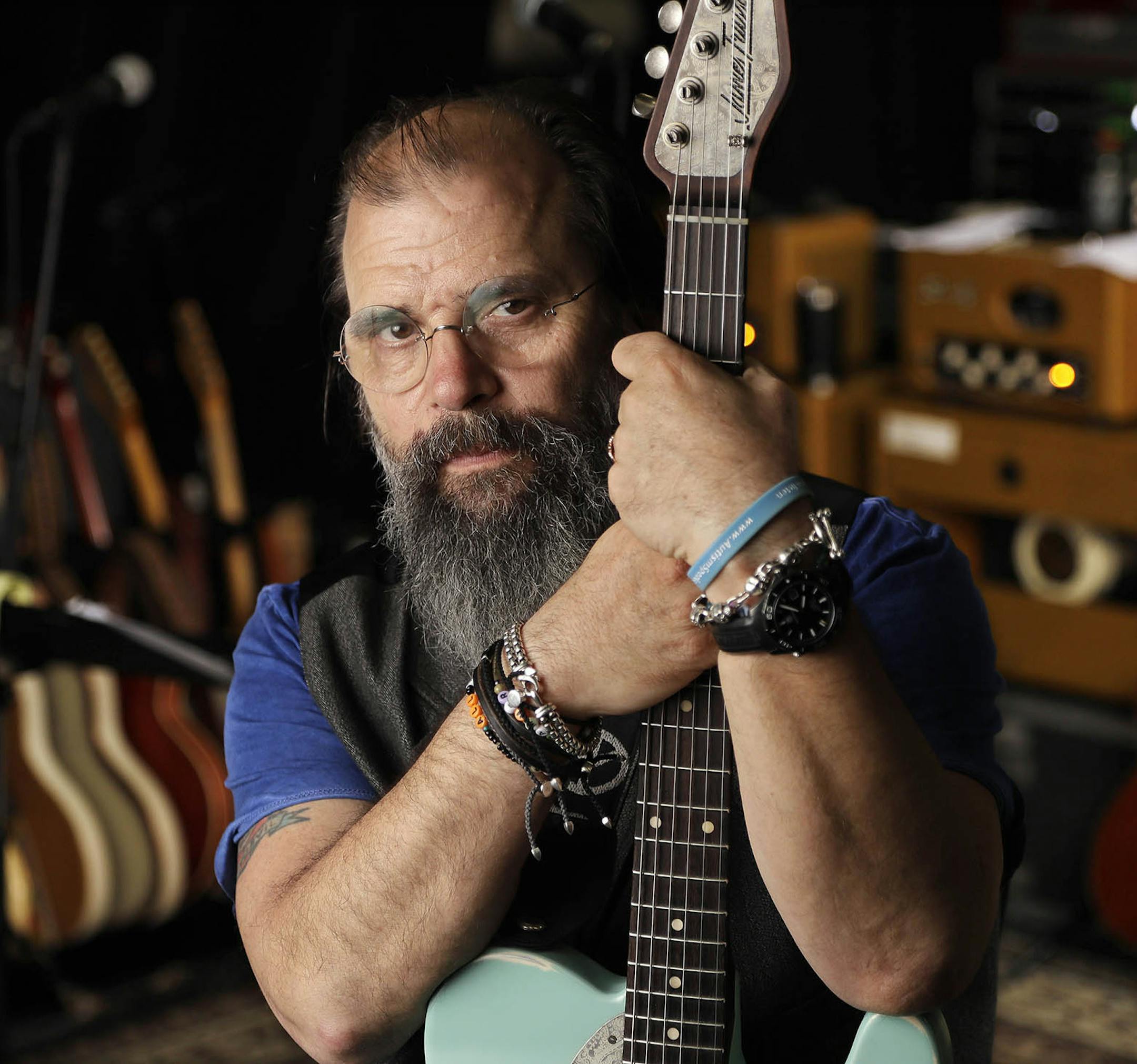 In this June 8, 2017, photo, Grammy-winning songwriter Steve Earle poses in a rehearsal studio in Nashville, Tenn. When Earle first arrived in Nashville from Austin in the ë70s, he was the young gun among a group of veteran singer-songwriters. It was the beginning of the outlaw movement, which Earle attempts to revisit on his new record, "So You Wannabe An Outlaw." (AP Photo/Mark Humphrey) ORG XMIT: NYET325