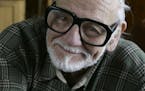 FILE - In this Monday, Jan. 21, 2008 file photo, director and writer George Romero poses for a photograph while talking about his film "Diary of the D