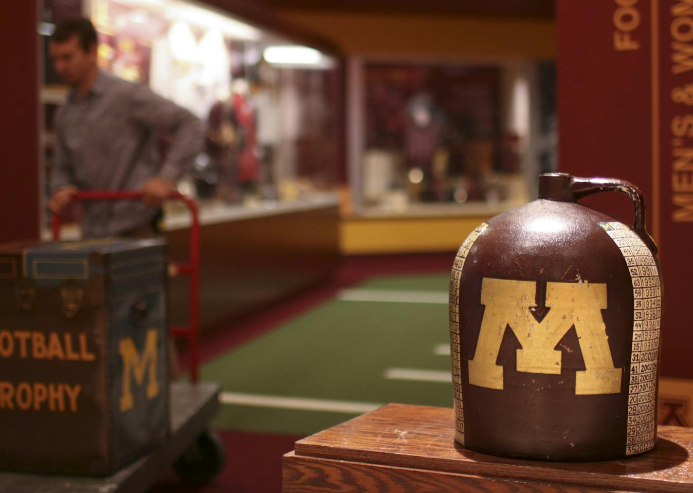 Mitch Kukay wheeled away the carrying case after he placed the Little Brown Jug on a pedestal at TCF Bank Stadium Wednesday afternoon. ] JEFF WHEELER &#x201a;&#xc4;&#xa2; jeff.wheeler@startribune.com U of M football fans were given an opportunity to view an artifact they haven't seen in a long time - the Little Brown Jug - the trophy traded back and forth between the University of Minnesota and the University of Michigan since 1903. The trophy was on display in the T. Denny Sanford Hall of Fame