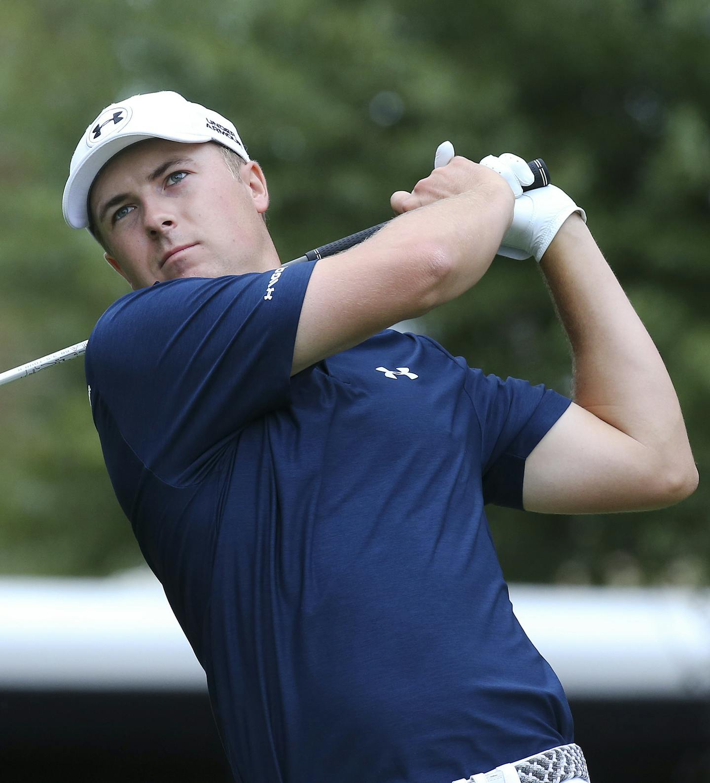 Jordan Spieth tees off on the fourth hole in the final round of the Tour Championship golf tournament at East Lake Golf Club, Sunday, Sept. 27, 2015, in Atlanta. (AP Photo/John Bazemore)