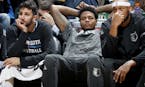 Ricky Rubio, Brandon Rush and Adreian Payne sat on the bench late in the fourth quarter. Utah beat Minnesota by a final score of 112-103. ] CARLOS GON