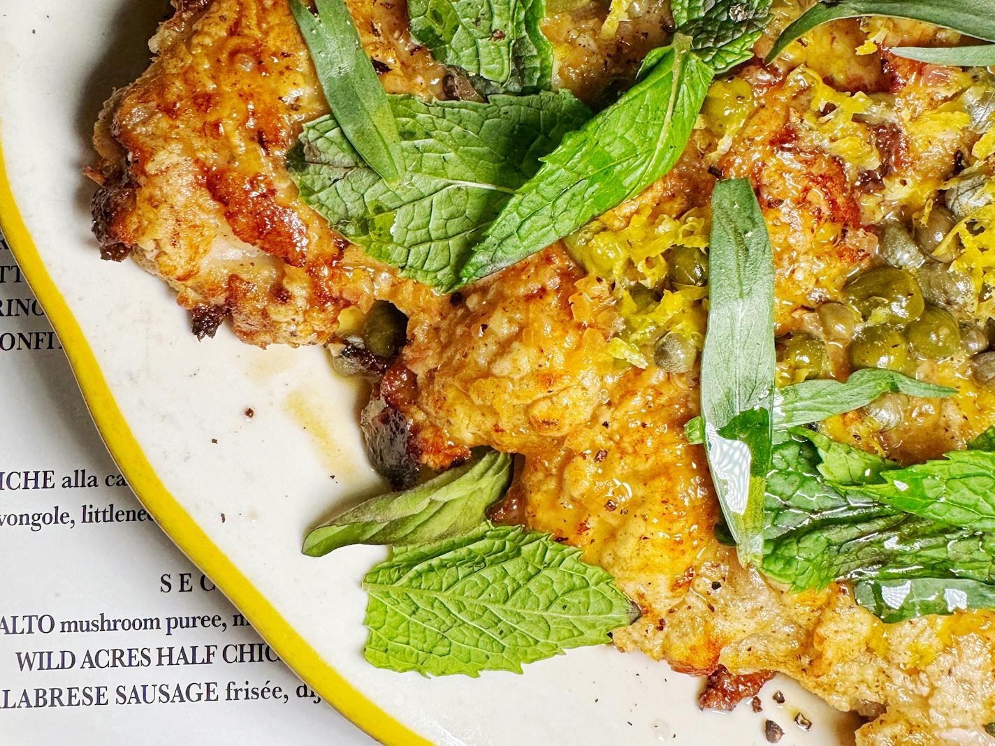 A plate of fried chicken with lemon-caper sauce from Hyacinth in St. Paul.