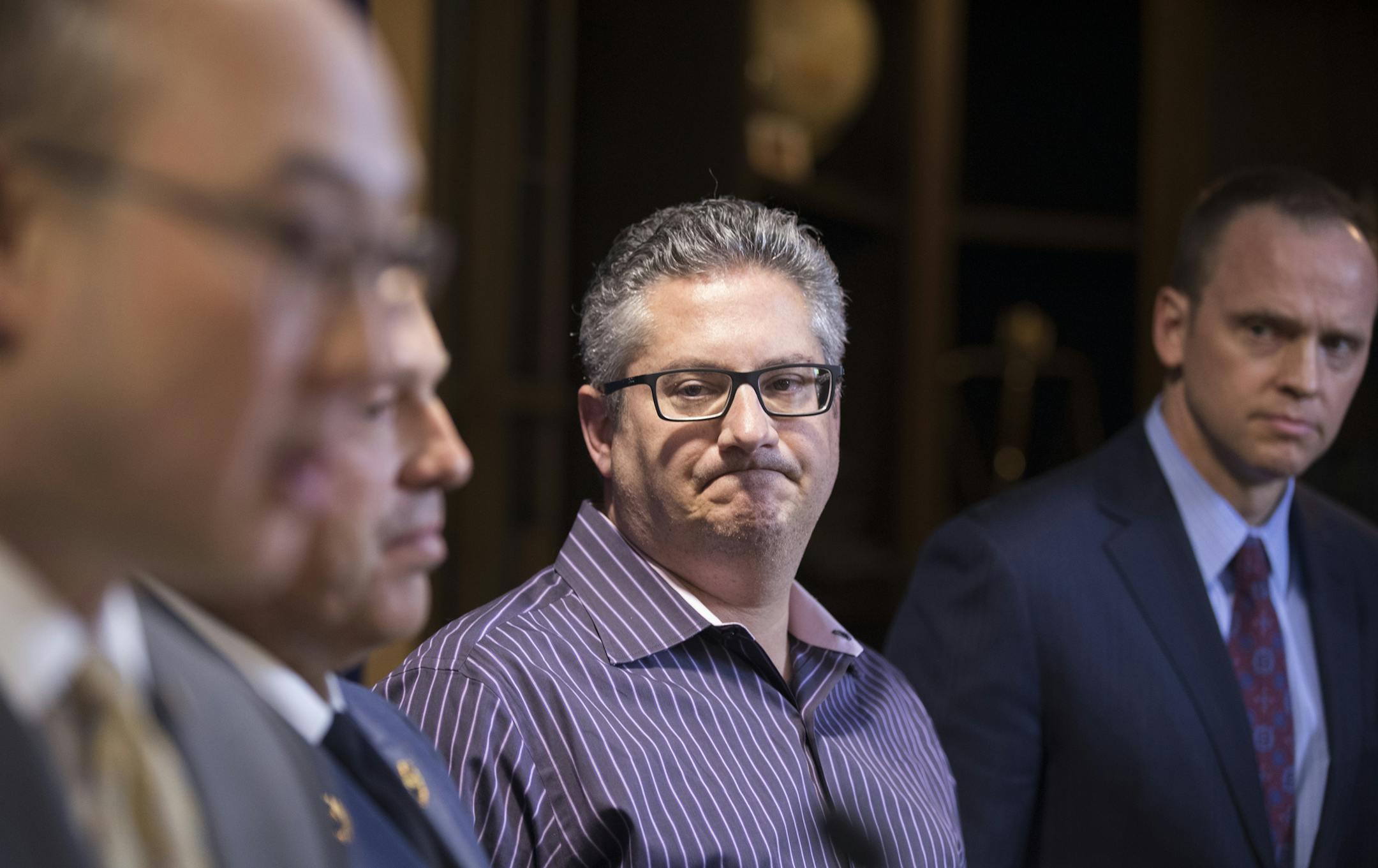 Mark Kuller, the grandson of Lillian Kuller, stands during the press conference. ] LEILA NAVIDI ï leila.navidi@startribune.com BACKGROUND INFORMATION: Press conference at the Ramsey County Attorney's office on Thursday, March 16, 2017 to announce second degree murder charges against Michael Anthony Withers in the 1987 murder of Lillian Kuller in St. Paul.