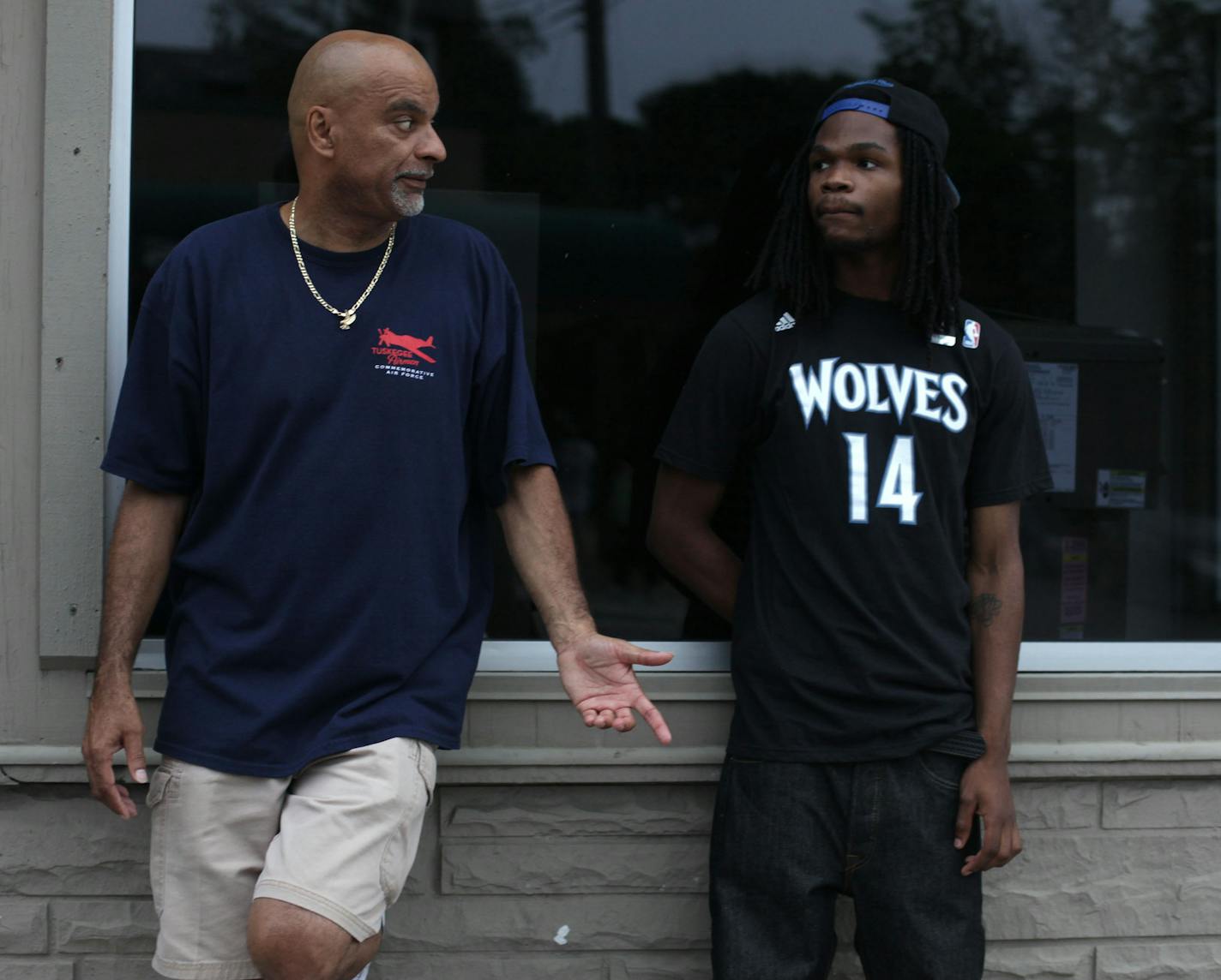 Steven Randall talks with Casey Davis, 20, on Friday evening on Payne Ave. in St. Paul.] Area youth workers patrol the streets of St. Paul to engage with youth. MONICA HERNDON monica.herndon@startribune.com St. Paul, MN 07/25/14