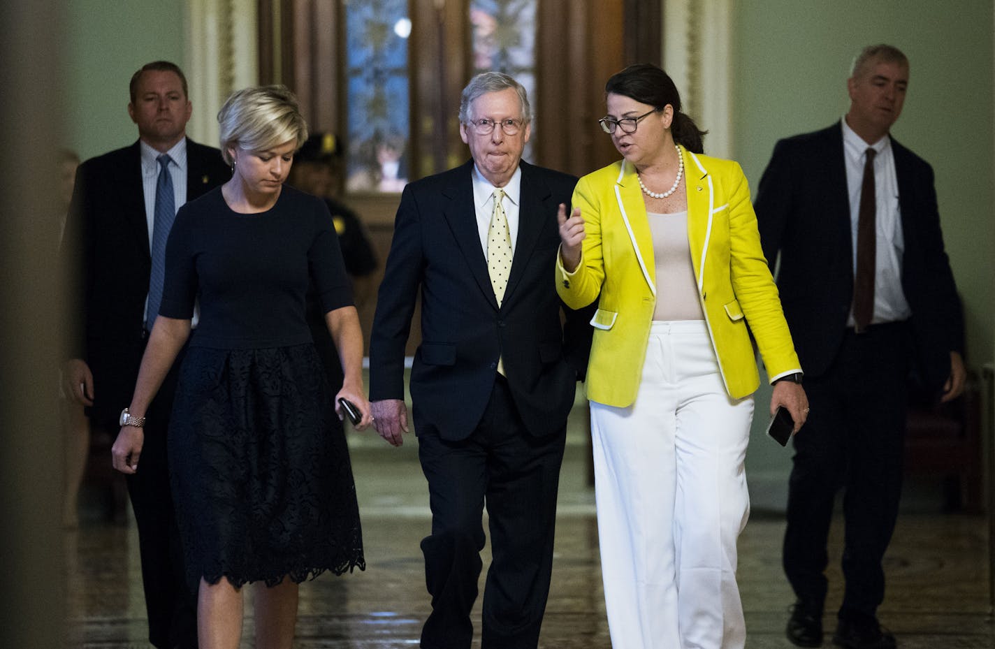 Senate Majority Leader Mitch McConnell (R-Ky.) walks off the Senate floor with staff members after speaking about the Senate Republican healthcare bill, at the U.S. Capitol in Washington, July 18, 2017. The night before, two more Republican senators declared that they would oppose the bill to repeal the Affordable Care Act, killing, for now, a seven-year-old promise to overturn President Barack Obama&#x2019;s signature domestic achievement. (Doug Mills/The New York Times)