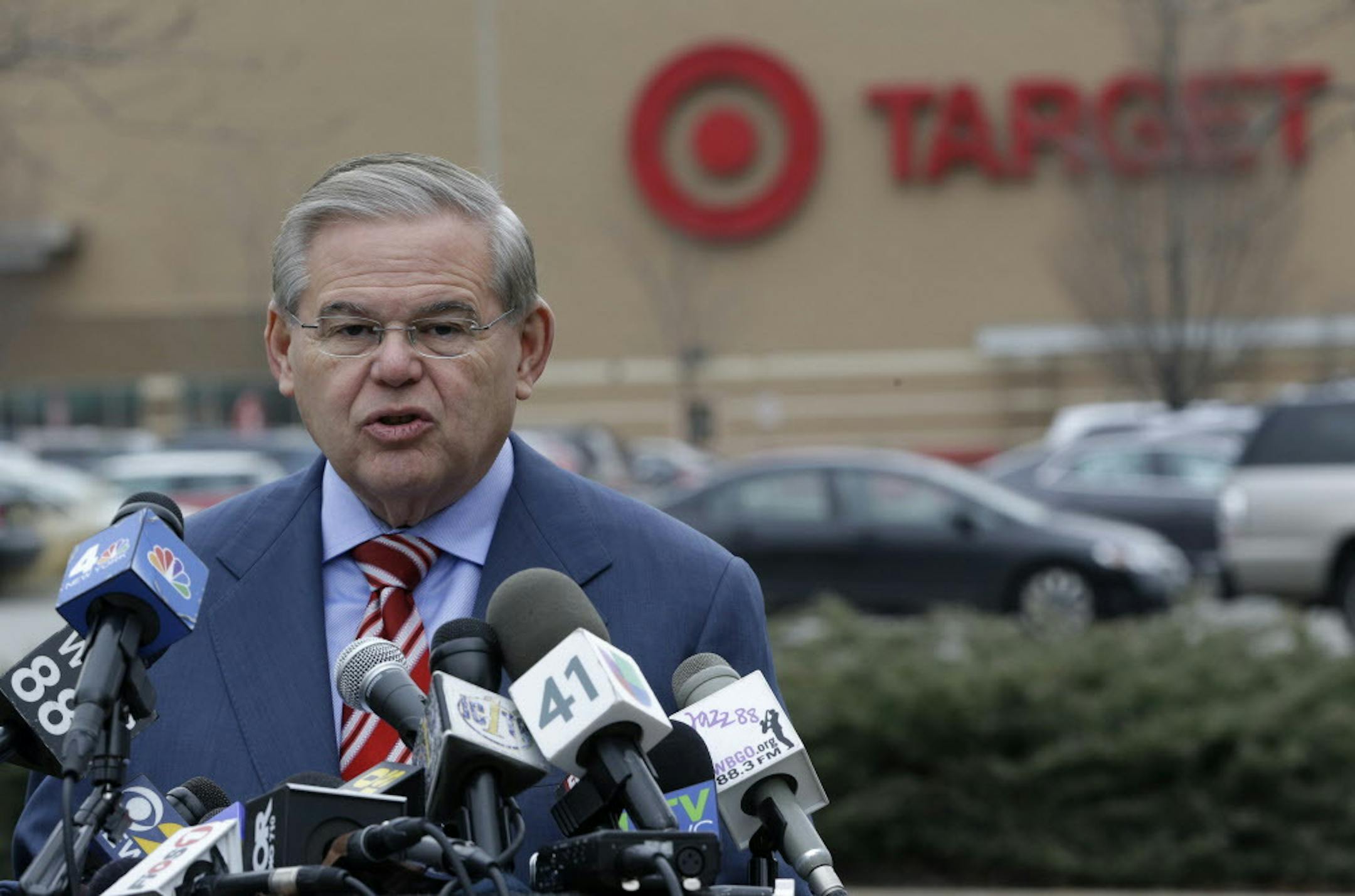 U.S. Sen. Robert Menendez talks during a news conference outside of a Target store, Thursday, Dec. 26, 2013, in Jersey City, N.J. Menendez, a member of the Senate banking committee, is laying out efforts to protect consumers' personal information, in light news that information from 40 million Target customers were stolen. (AP Photo/Julio Cortez)