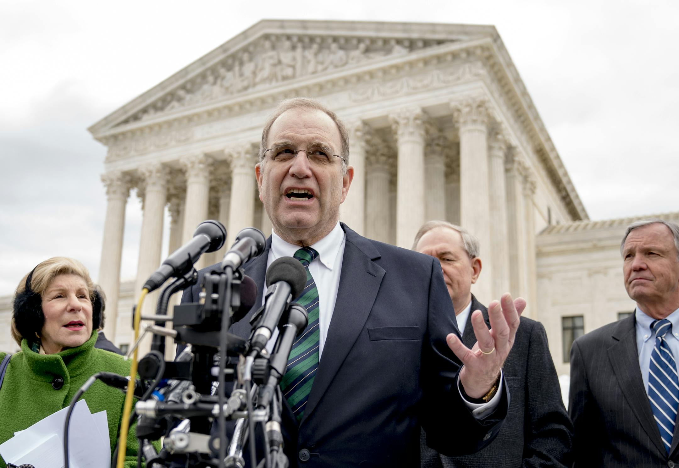 George Isaacson of Brann & Isaacson, representing Wayfair, Overstock.Com and Newegg, speaks outside the Supreme Court after the court hears oral arguments on a case involving a rule stemming from two, decades-old Supreme Court cases on state's sales tax collection, Tuesday, April 17, 2018, in Washington. South Dakota v. Wayfair is a case arguing about whether a rule the Supreme Court announced decades ago in a case involving a catalog retailer should still apply in the age of the internet. Also