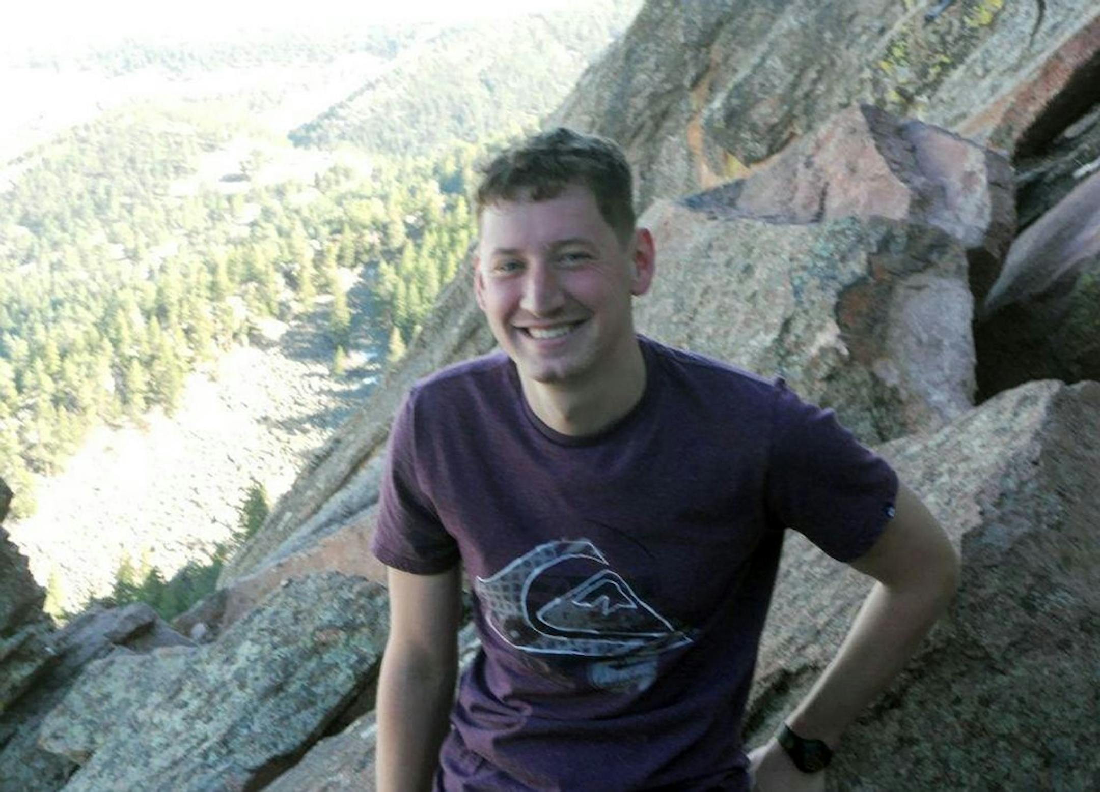 This undated photo provided by the Larimer family shows John Larimer. Relatives have identified Larimer, a U.S. Navy sailor, as one of the victims killed by a gunman at a showing of the new Batman movie, early Friday, July 20, 2012, in Aurora, Colo.