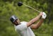 Tony Finau drives off the 16th tee during the final round of the PGA Championship golf tournament, Sunday, May 19, 2019, at Bethpage Black in Farmingd