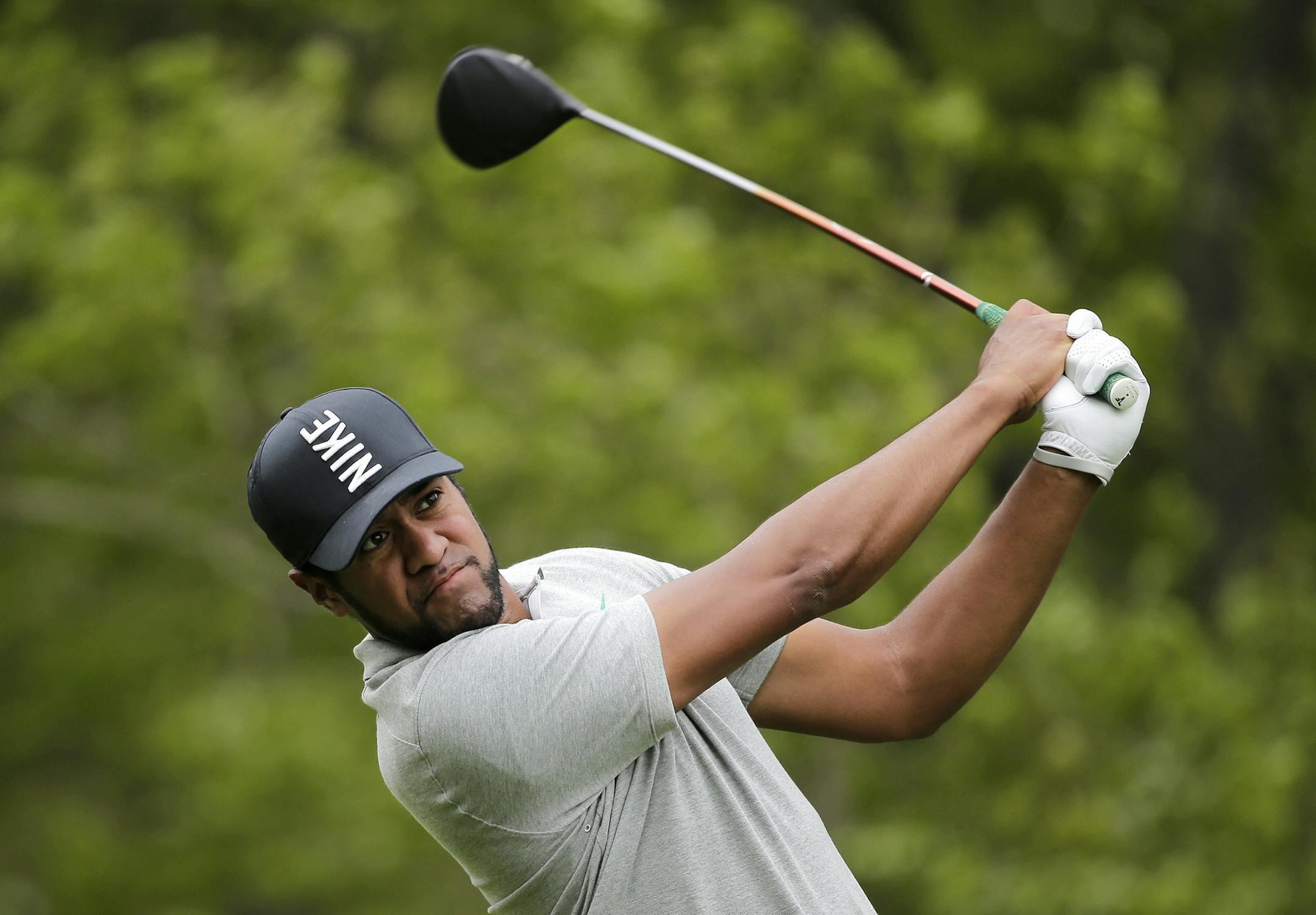 Tony Finau drives off the 16th tee during the final round of the PGA Championship golf tournament, Sunday, May 19, 2019, at Bethpage Black in Farmingdale, N.Y. (AP Photo/Seth Wenig)