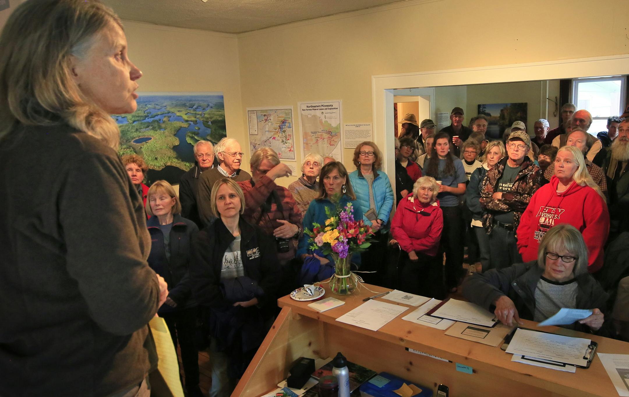 Rebecca Rom spoke to a packed house May 30 during the grand opening of Sustainable Ely educational center opposed to mining.