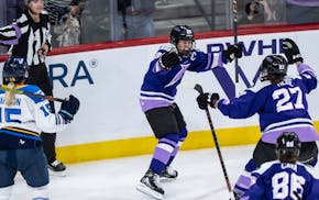 Frost captain Kendall Coyne Schofield, middle, celebrates a game-tying goal vs. Toronto in Minnesota's 4-3, series clinching overtime victory last Thu
