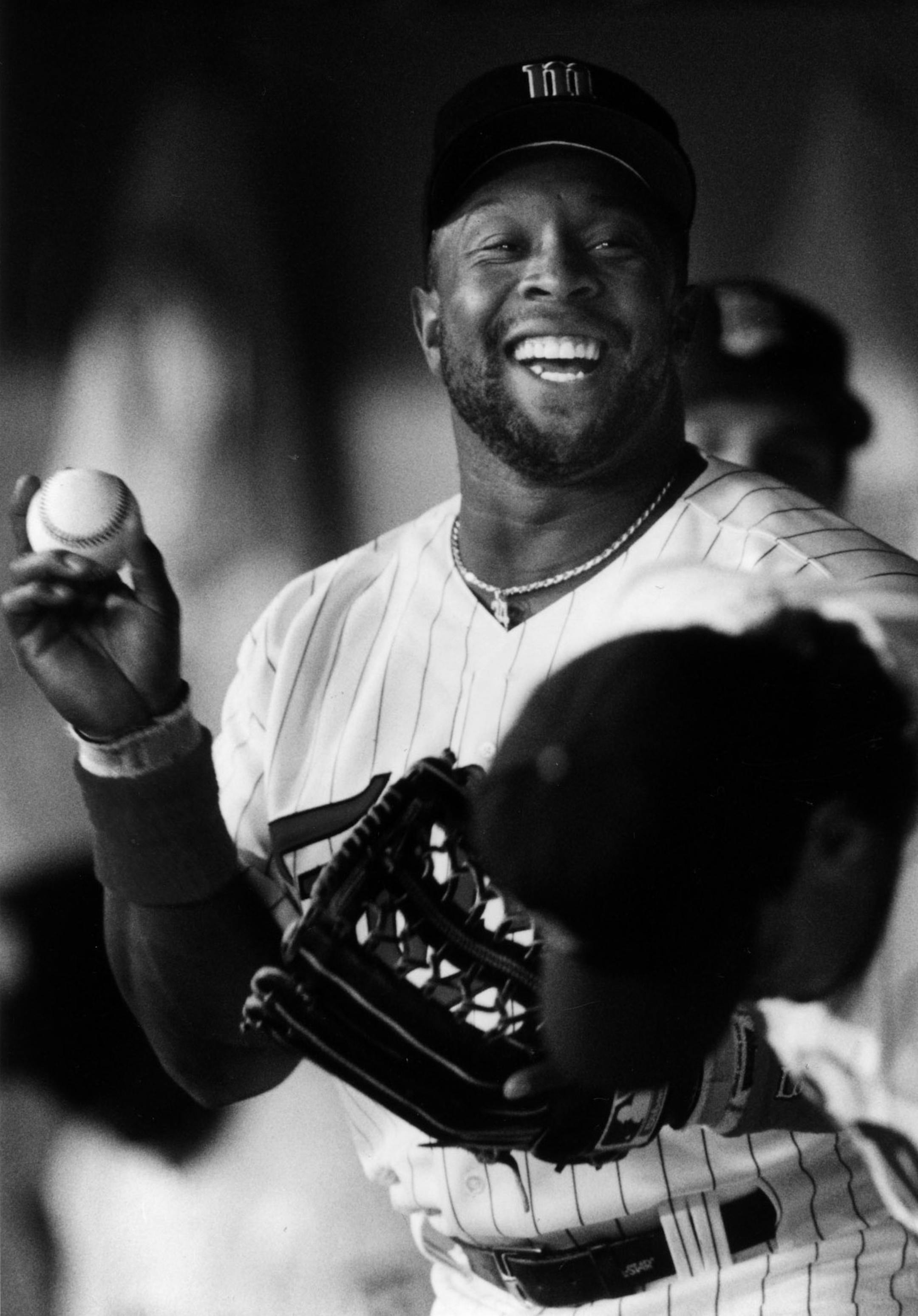 Kirby Puckett was all smiles as he joked with other Twins players before the season opener at the Metrodome in 1993. It was downhill from there.