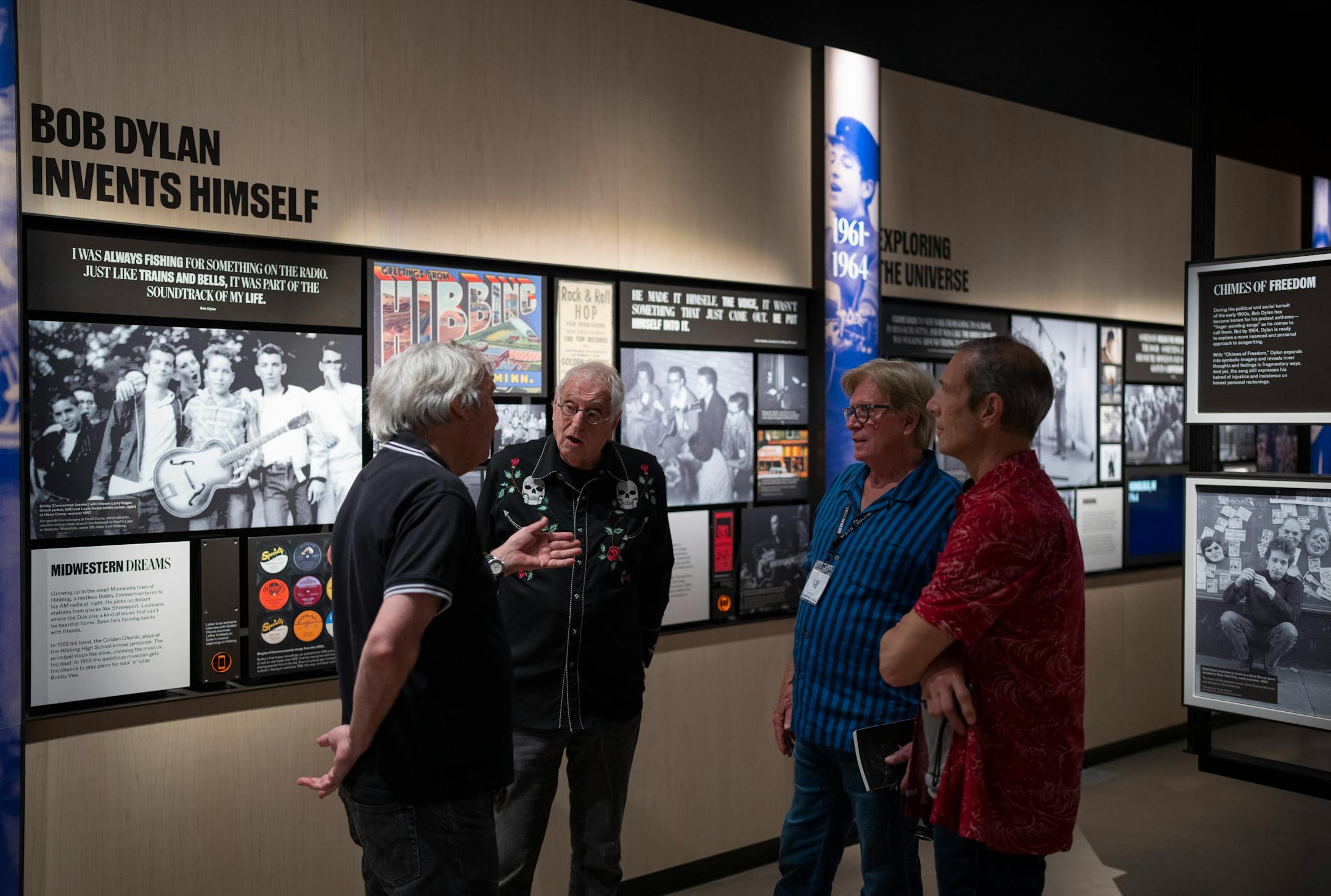 Clinton Heylin, Dick Cohn and musicians Kevin Odegard and Gary Lopac discussed Bob Dylan's Minnesota years near a display with that theme. Heylin is an authority on Dylan; Cohn went to summer camp with Dylan; Odegard played guitar on "Blood on the Tracks," and Lopac is a friend of Odegard's.