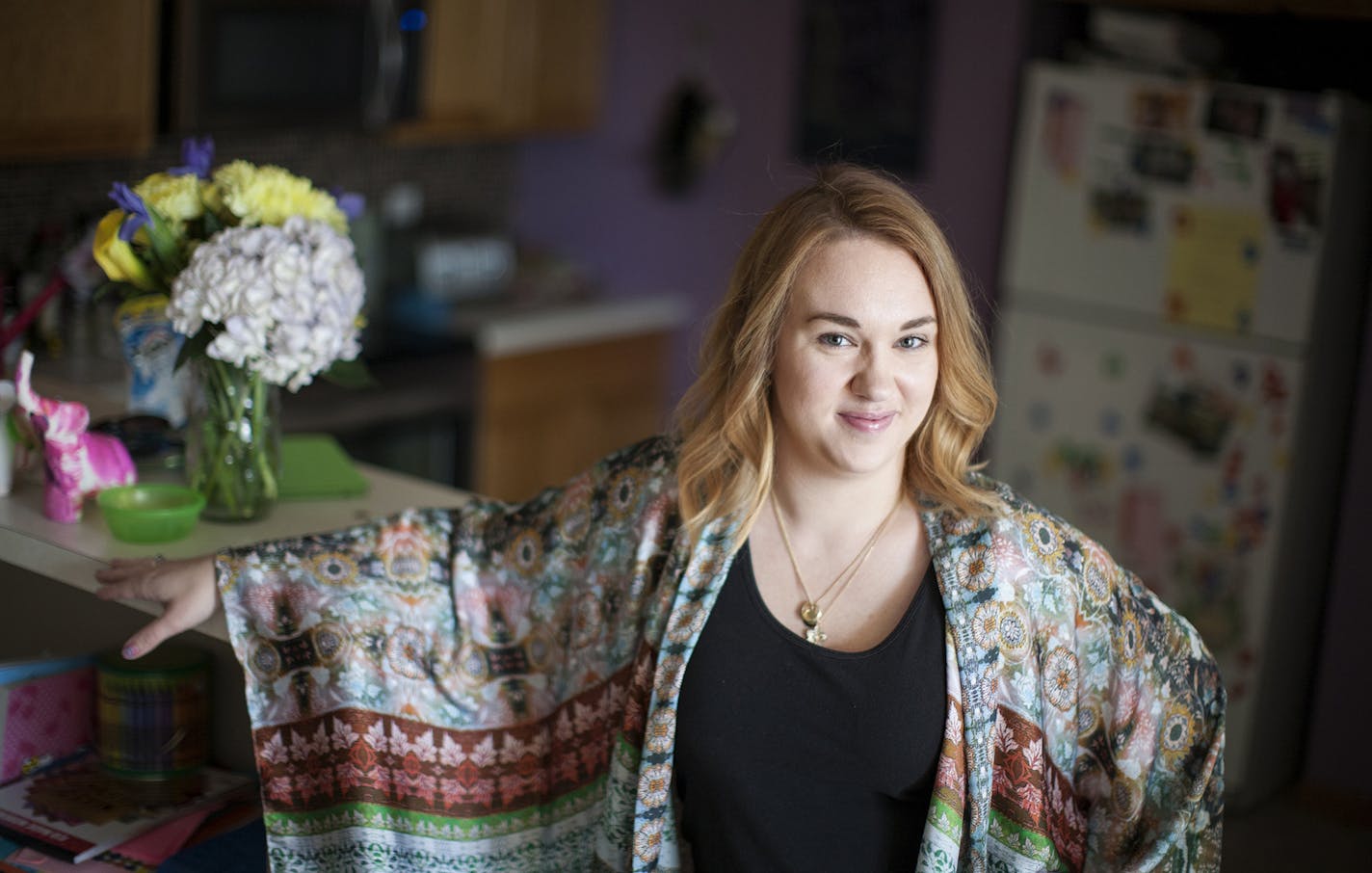 Claire Nielsen photographed at her family's home in Maple Grove June 9, 2015. Claire carried twins as a gestational surrogate for a California couple and gave birth to them in December of 2014. (Courtney Perry/Special to the Star Tribune)