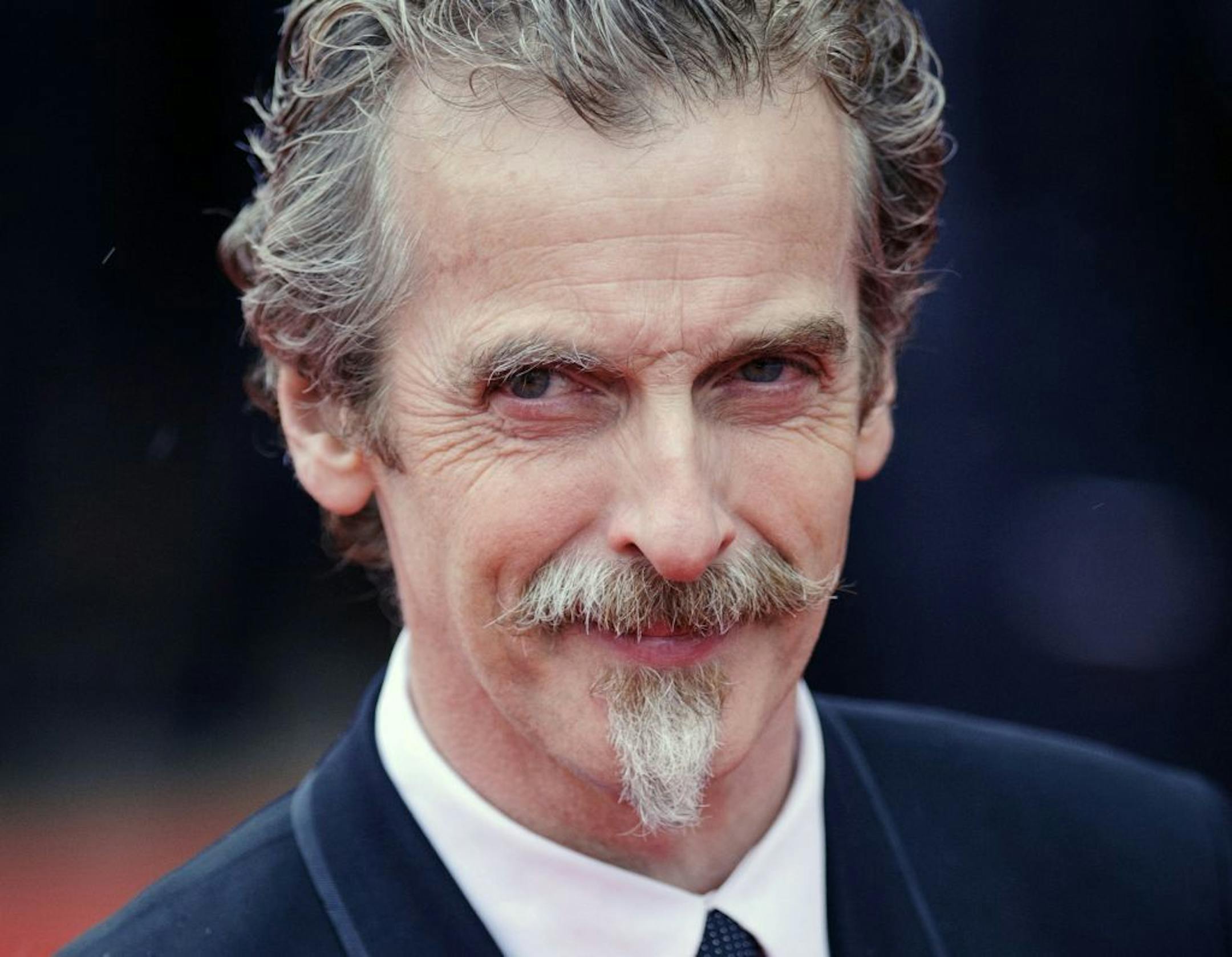 FILE- Glasgow-born actor and Oscar winner Peter Capaldi, as he appeared in London in this file photo dated May 12, 2013. Peter Capaldi is named late Sunday Aug. 4, 2013, as the next lead star for the long-running British science fiction TV series "Doctor Who." (AP Photo / Dominic Lipinski, PA, FILE) UNITED KINGDOM OUT - NO SALES - NO ARCHIVES