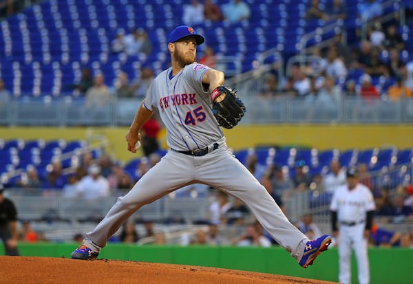 On April 11, 2018, New York Mets pitcher Zack Wheeler works against the Miami Marlins at Marlins Park in Miami. On Wednesday, Sept. 5, 2018, the right