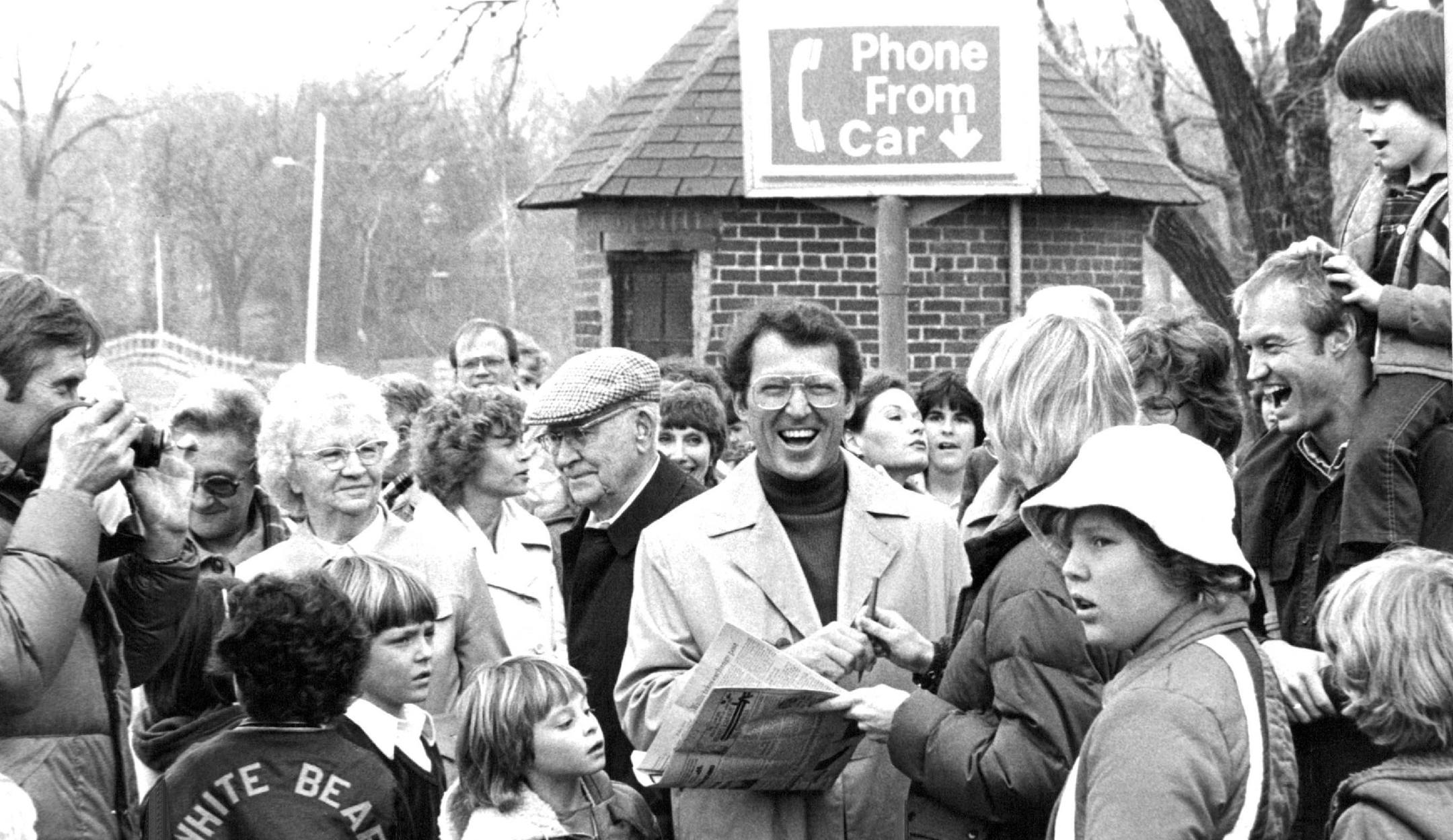 Gerry Spiess signed autographs and greeted friends on Manitou Island in White Bear Lake. A boat launch on the Island was renamed Spiess Landing in a ceremony in 1981.