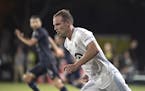 Minnesota United defender Chase Gasper (77) follows a play during the second half of an MLS soccer match against Sporting Kansas City, Sunday, July 12