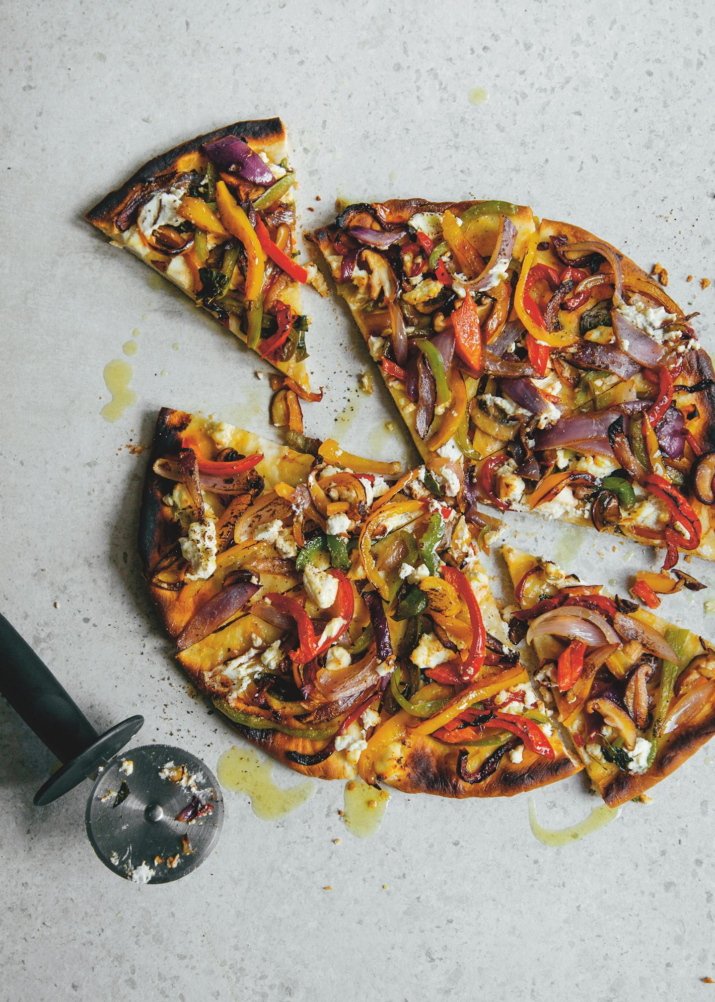 Barbecued Mediterranean Pizza With Basil Oil and Ricotta is among the recipe cards in "The BBQ Companion" deck from Oscar Smith (Smith Street, $24.95). Photo: Billy Law