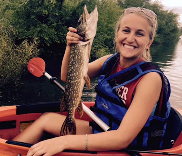 Emily Thedens with her northern pike.