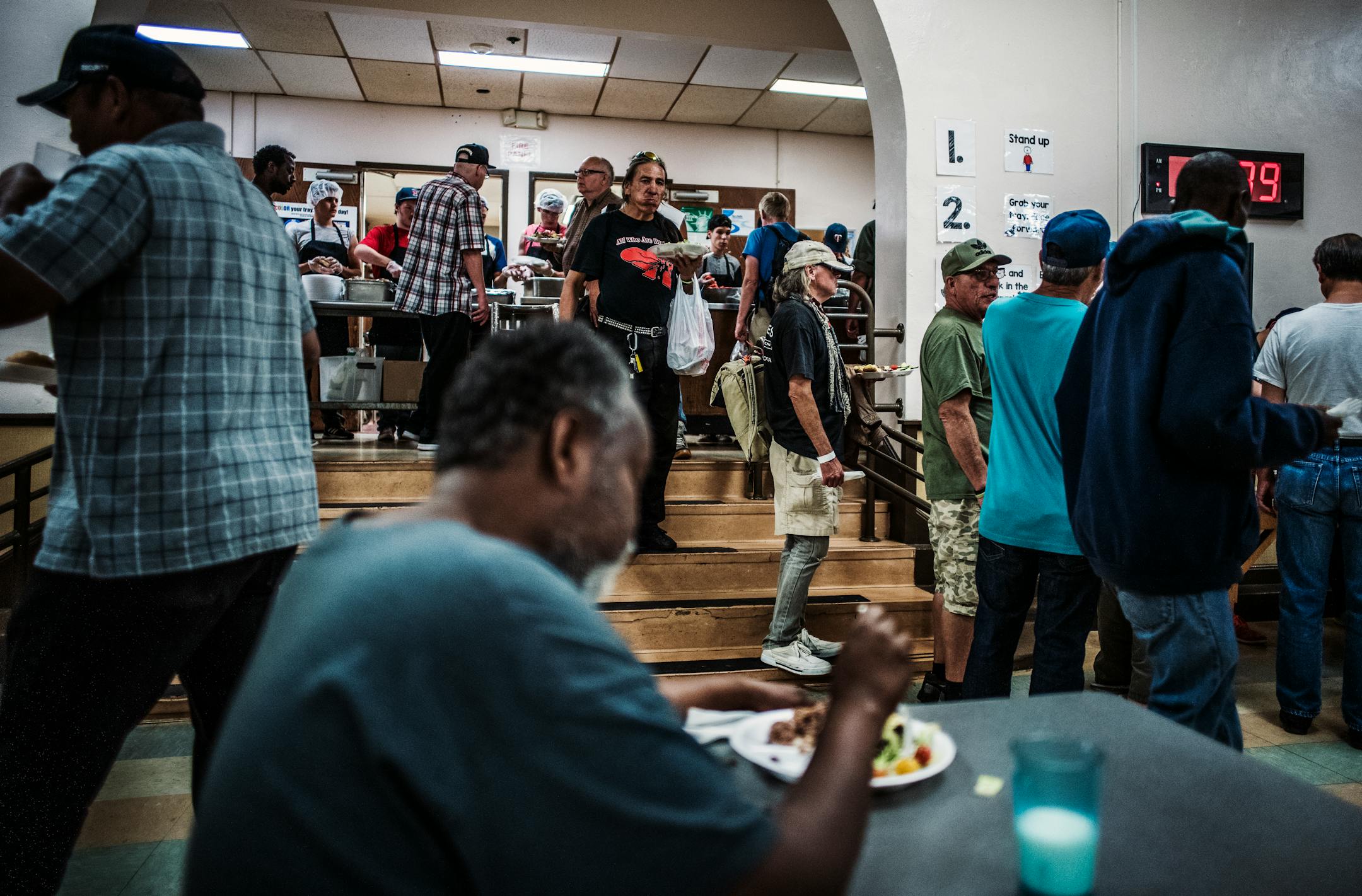 People gathered for a Loaves and Fishes meal in August.