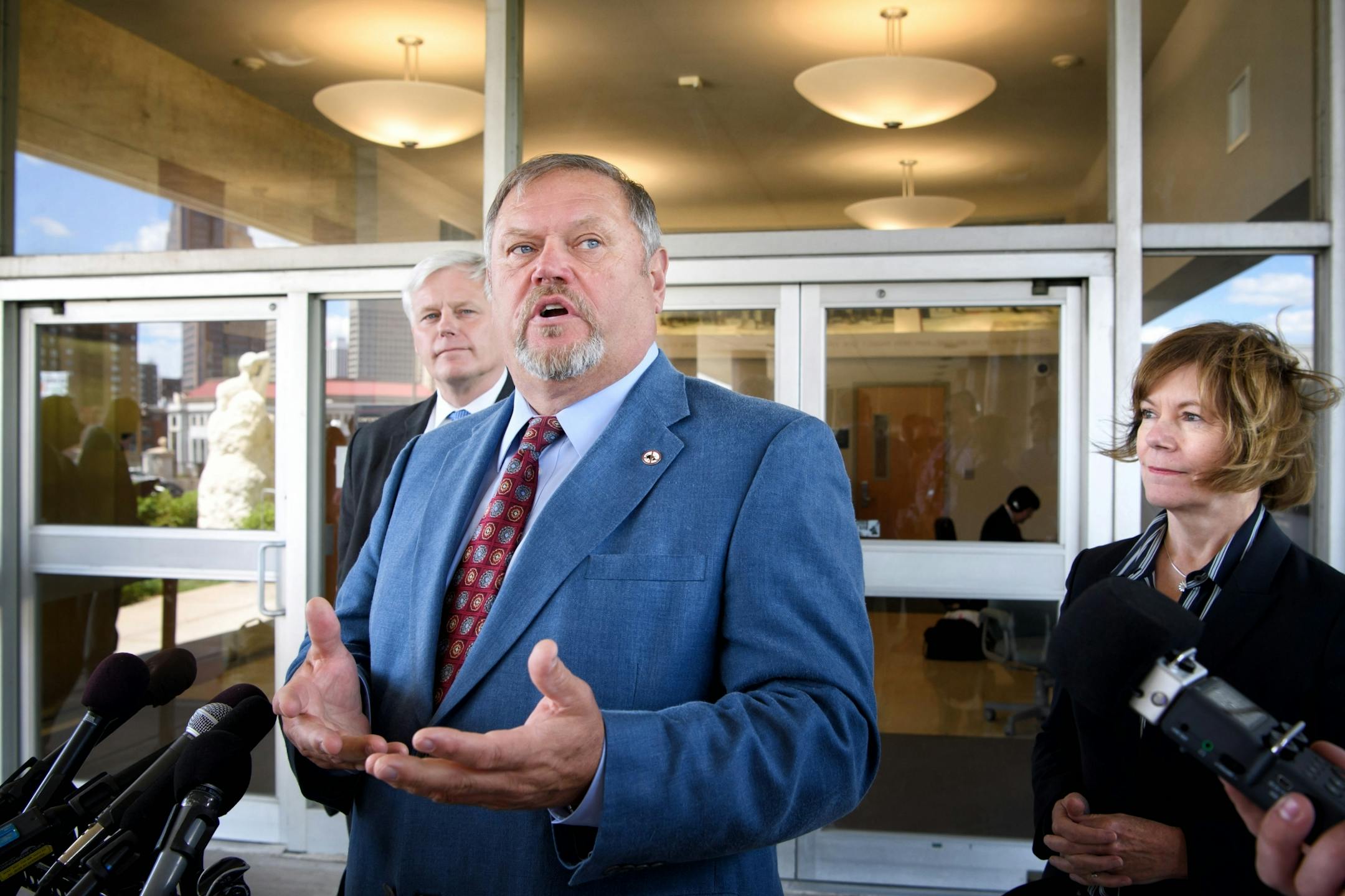 DFL leaders House Minority Leader Paul Thissen, Senate Majority Leader Tom Bakk and Lt. Governor Tina Smith spoke outside the Governor's office after the Republicans.