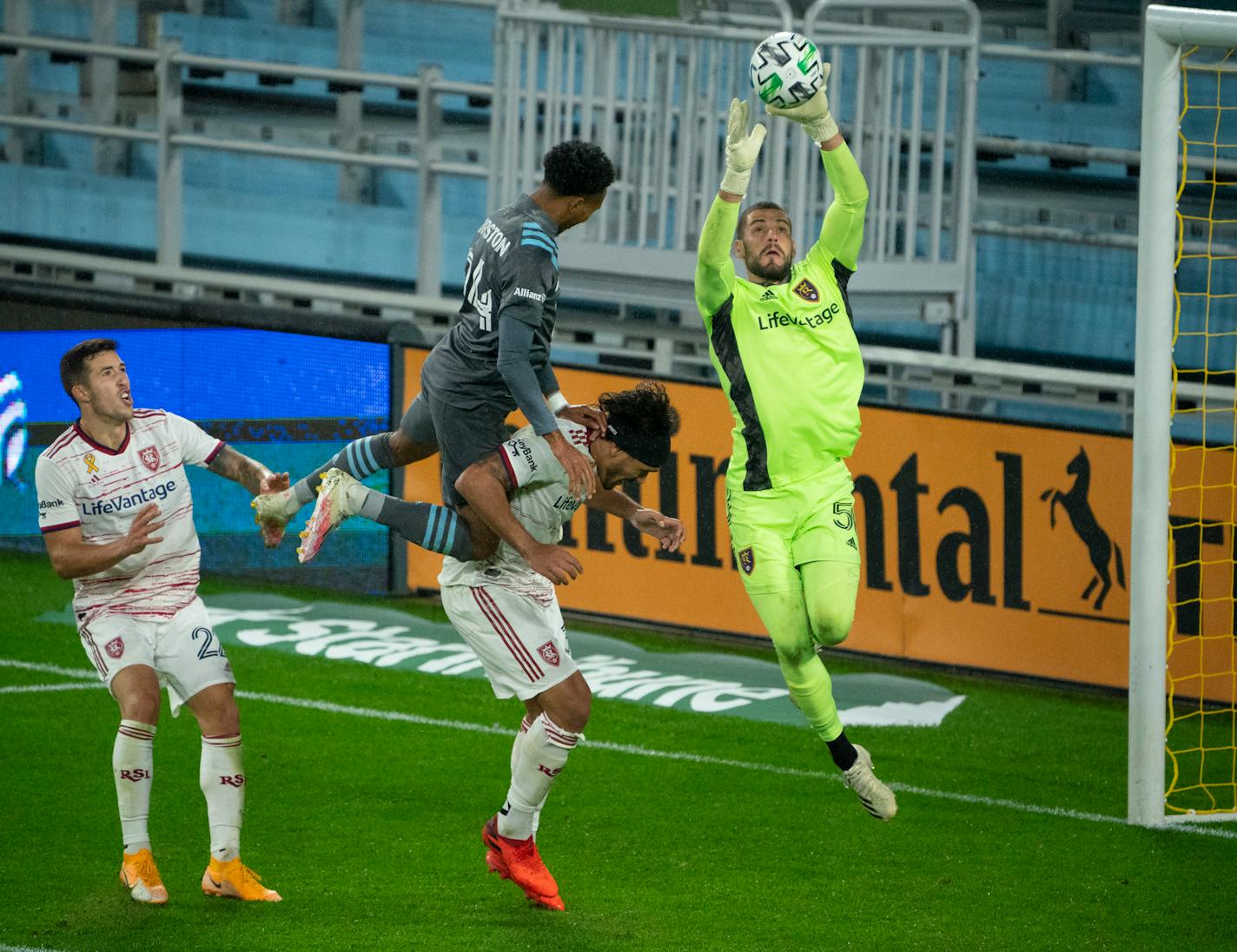 Real Salt Lake goalkeeper Andrew Putna made a second half save while Minnesota United midfielder Marlon Hairston (94) and Real Salt Lake defender Marco Silva collided.