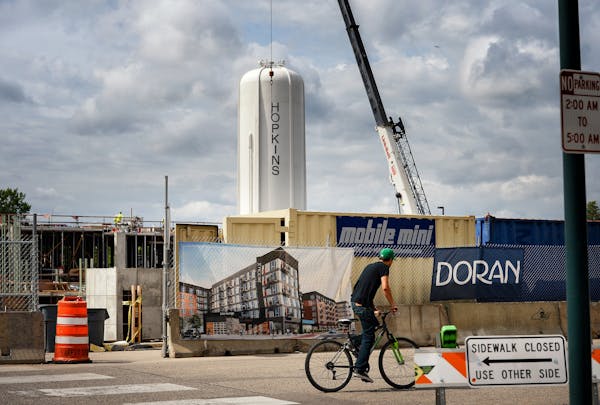Construction of The Moline, a luxury apartment complex in Hopkins. ] GLEN STUBBE * gstubbe@startribune.com Tuesday, July 19, 2016 With the future of t