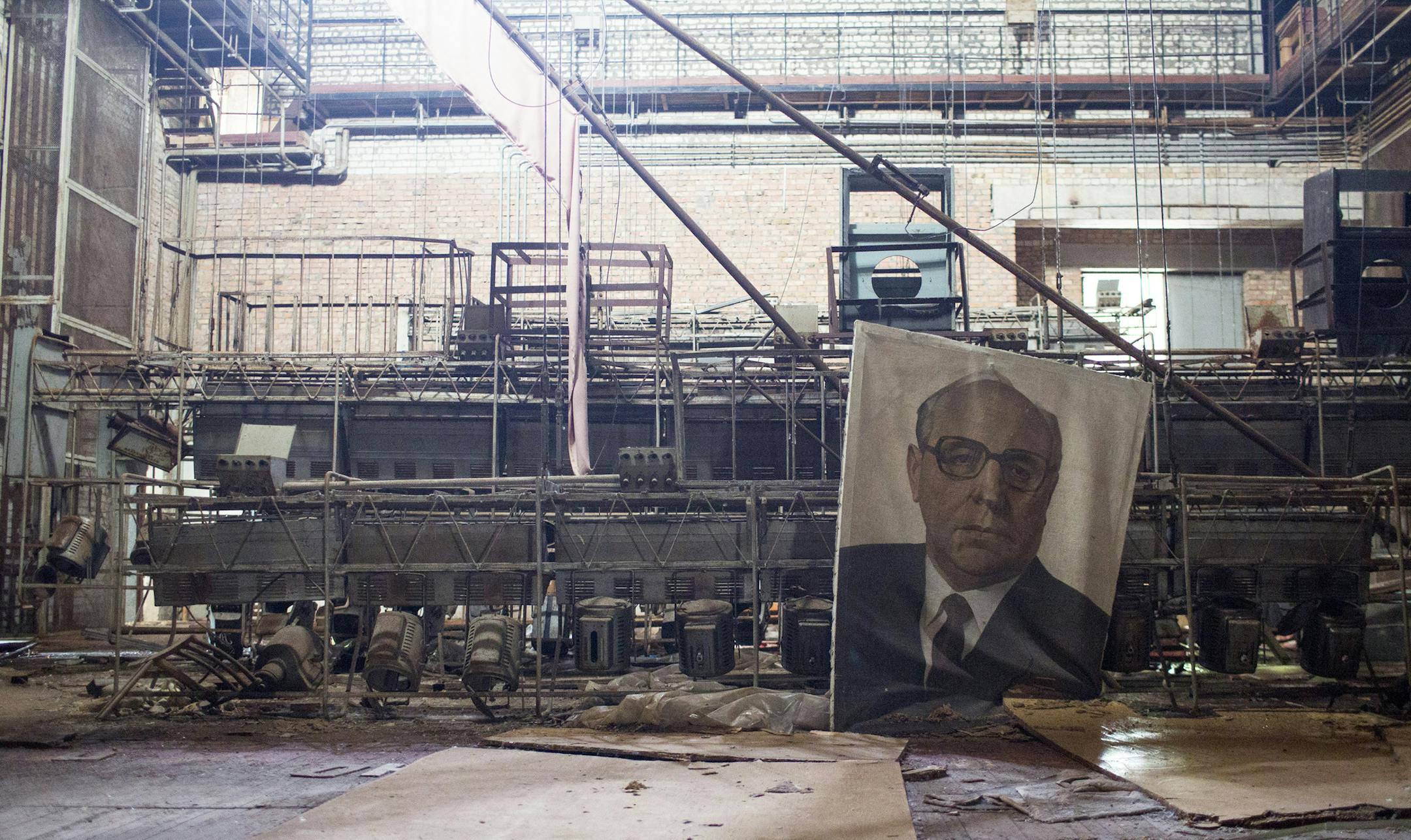 A theater in the abandoned city of Pripyat -- where 45,000 once lived -- which was completely evacuated about 36 hours after the Chernobyl nuclear disaster, in Ukraine, Sept. 17, 2013. A vast new structure is being built to enclose the disaster site's crumbling original concrete and steel containment sarcophagus, to allow cleanup efforts to progress, and to prevent further radiation releases. (William Daniels/The New York Times)