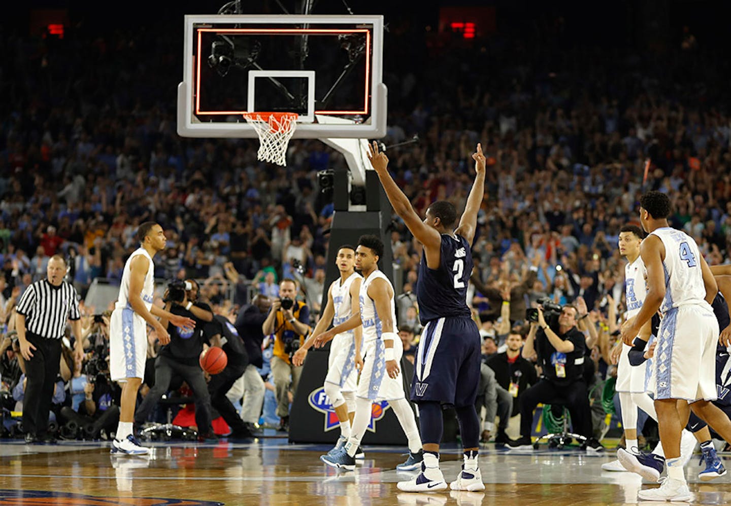 Villanova's Kris Jenkins (2) reacts to his gamne winning three point basket at the conclusion of the NCAA Final Four tournament college basketball championship game against North Carolina, Monday, April 4, 2016, in Houston. Villanova won 77-74.