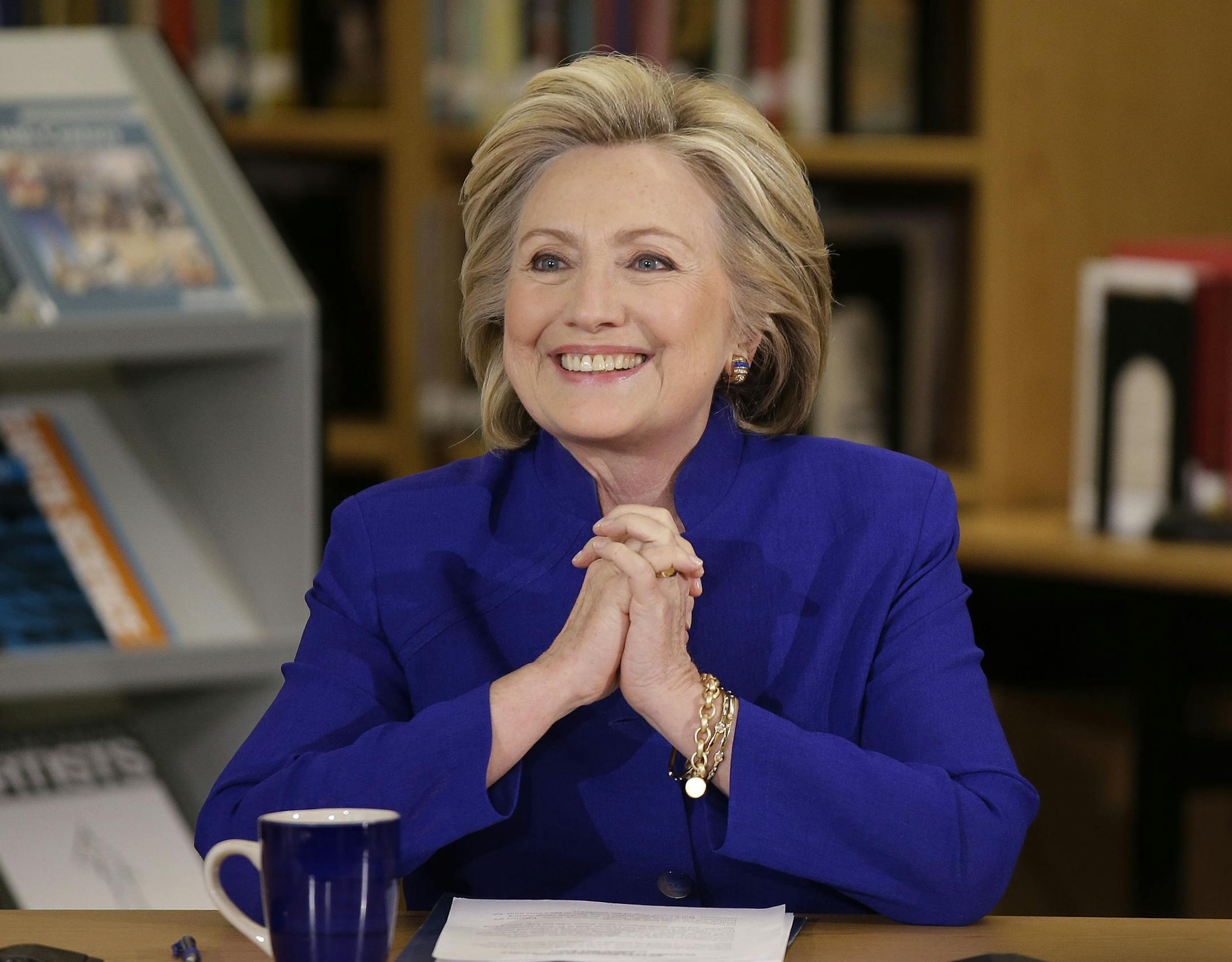 FILE — Hillary Clinton attends a roundtable discussion at Rancho High School in North Las Vegas, Nev., May 5, 2015. Clinton appears poised to make Republican-enacted restrictions on voter access a key part of her campaign, as Democratic allies file legal challenges against identification requirements and other measures that could prove decisive in a close campaign. (Isaac Brekken/The New York Times)