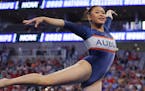 Auburn's Suni Lee competes in the floor exercise during the NCAA women's gymnastics championships Saturday in Fort Worth, Texas.