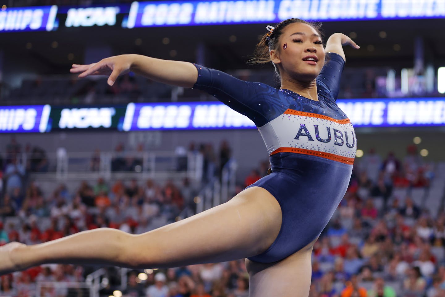 Auburn's Suni Lee competes in the floor exercise during the NCAA women's gymnastics championships Saturday in Fort Worth, Texas.