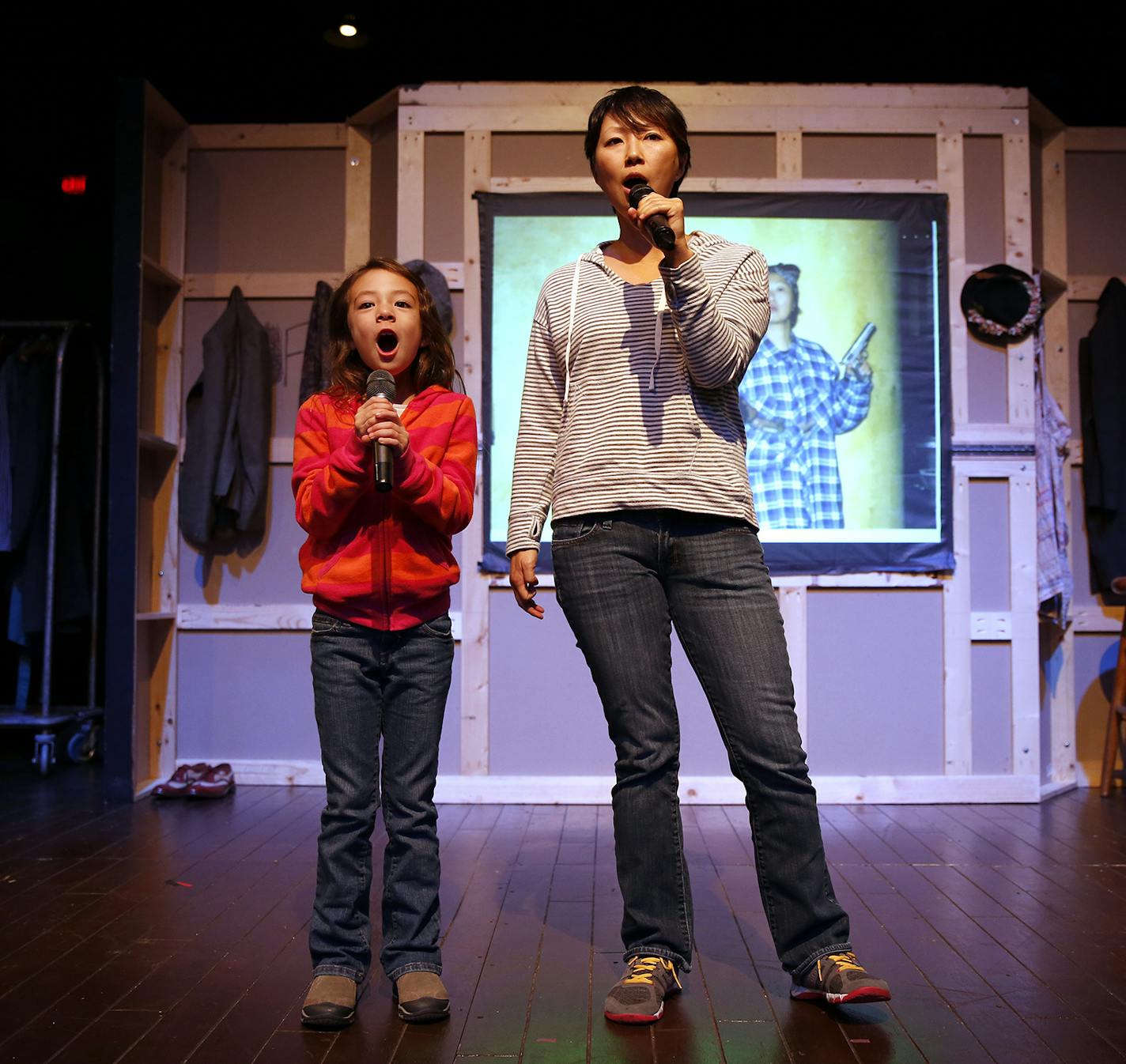 Former Minnesotan Amy Anderson and her 7-year-old daughter Aubrey Anderson-Emmons, who plays "Lily" on the television show "Modern Family," rehearse the song "Together, Wherever We Go" by Bette Midler for a fundraiser at Illusion Theater in Minneapolis. ] LEILA NAVIDI leila.navidi@startribune.com / BACKGROUND INFORMATION: Saturday, October 18, 2014. Amy Anderson, a stand up comedian and actress herself, talks about being a parent of a child actor.