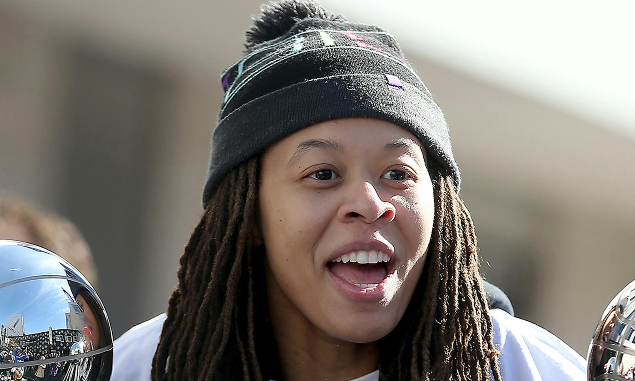 Minnesota Lynx Seimone Augustus greeted fans during their Championship parade along Hennepin Avenue, Friday, October 16, 2015 in Minneapolis, MN. ] (ELIZABETH FLORES/STAR TRIBUNE) ELIZABETH FLORES ï eflores@startribune.com ORG XMIT: MIN1510161307021059