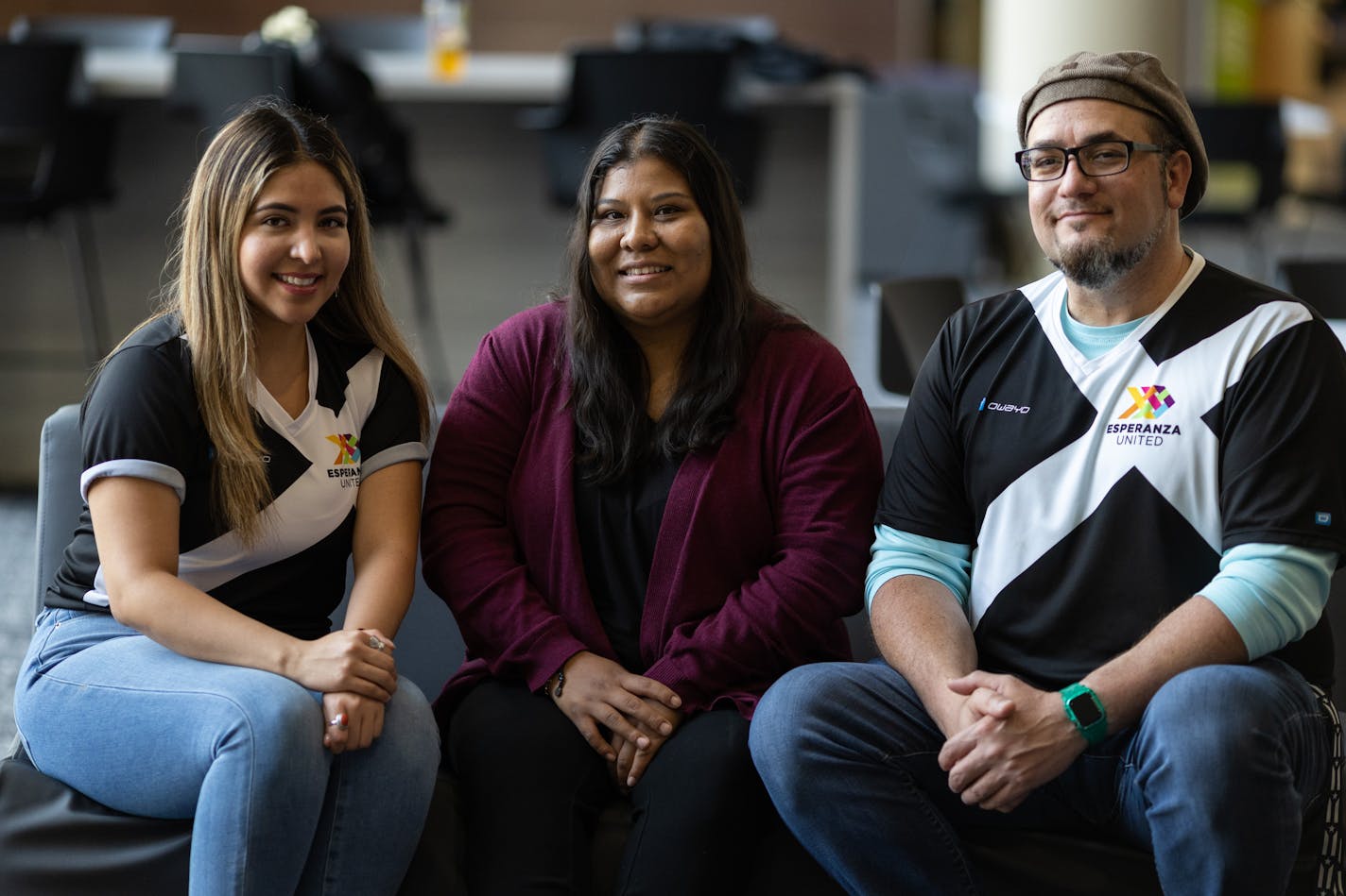 Beverly Martinez (from left), Nallely Castro Montoya and Felix Martinez, sit for a photo inside the Anderson Student Center at the University of St. Thomas in St. Paul on Wednesday, June 21, 2023.