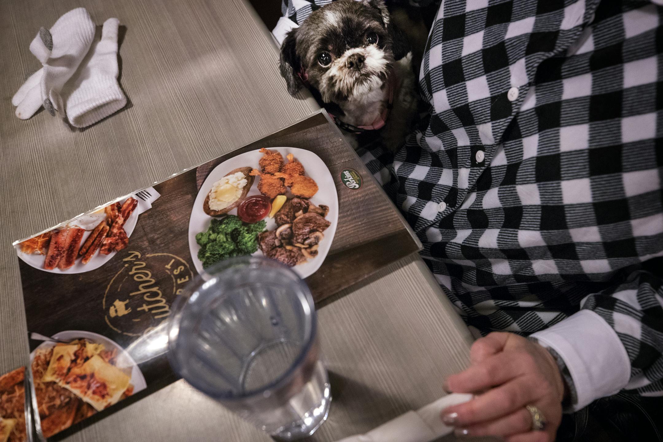 Jane Poeschel and her Shih Tzu therapy dog Trudy sat down fro dinner at Perkins in New Brighton. ] CARLOS GONZALEZ ï cgonzalez@startribune.com - November 2017, Jane Poeschel and her Shih Tzu therapy dog Trudy, the unassuming pair that found themselves in the middle of a federal lawsuit about disability rights and housing discrimination