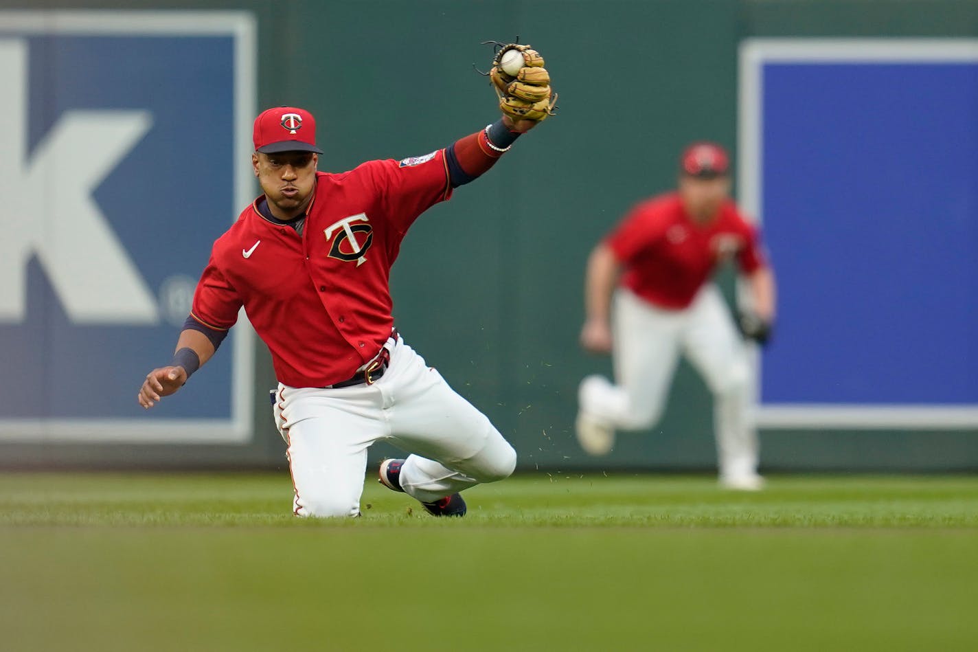 Minnesota Twins second baseman Jorge Polanco fields the ball to force out San Francisco Giants' Tommy La Stella during the first inning of a baseball game Friday, Aug. 26, 2022, in Minneapolis. (AP Photo/Abbie Parr)